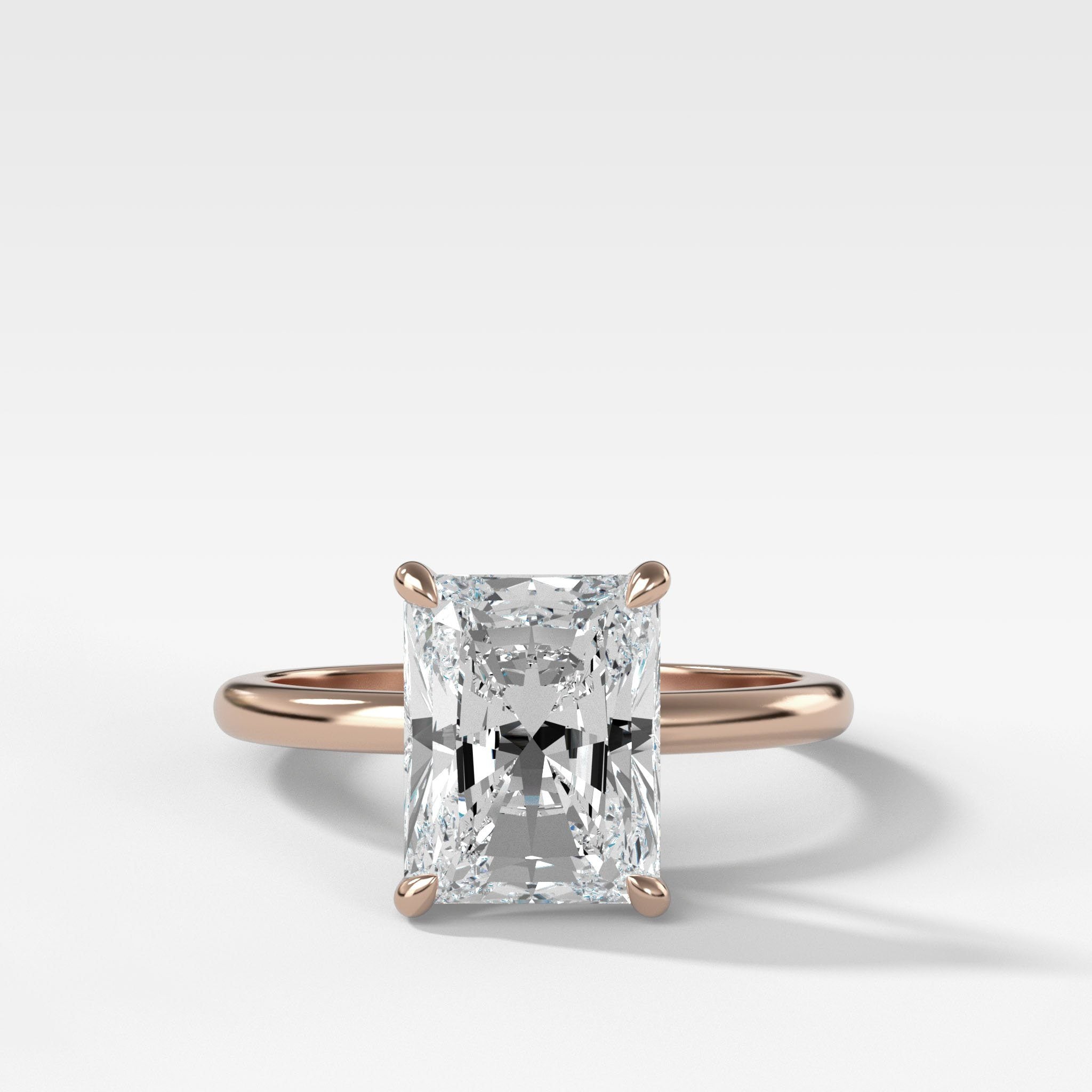Crescent Solitaire Engagement Ring With Elongated Radiant Cut Diamond