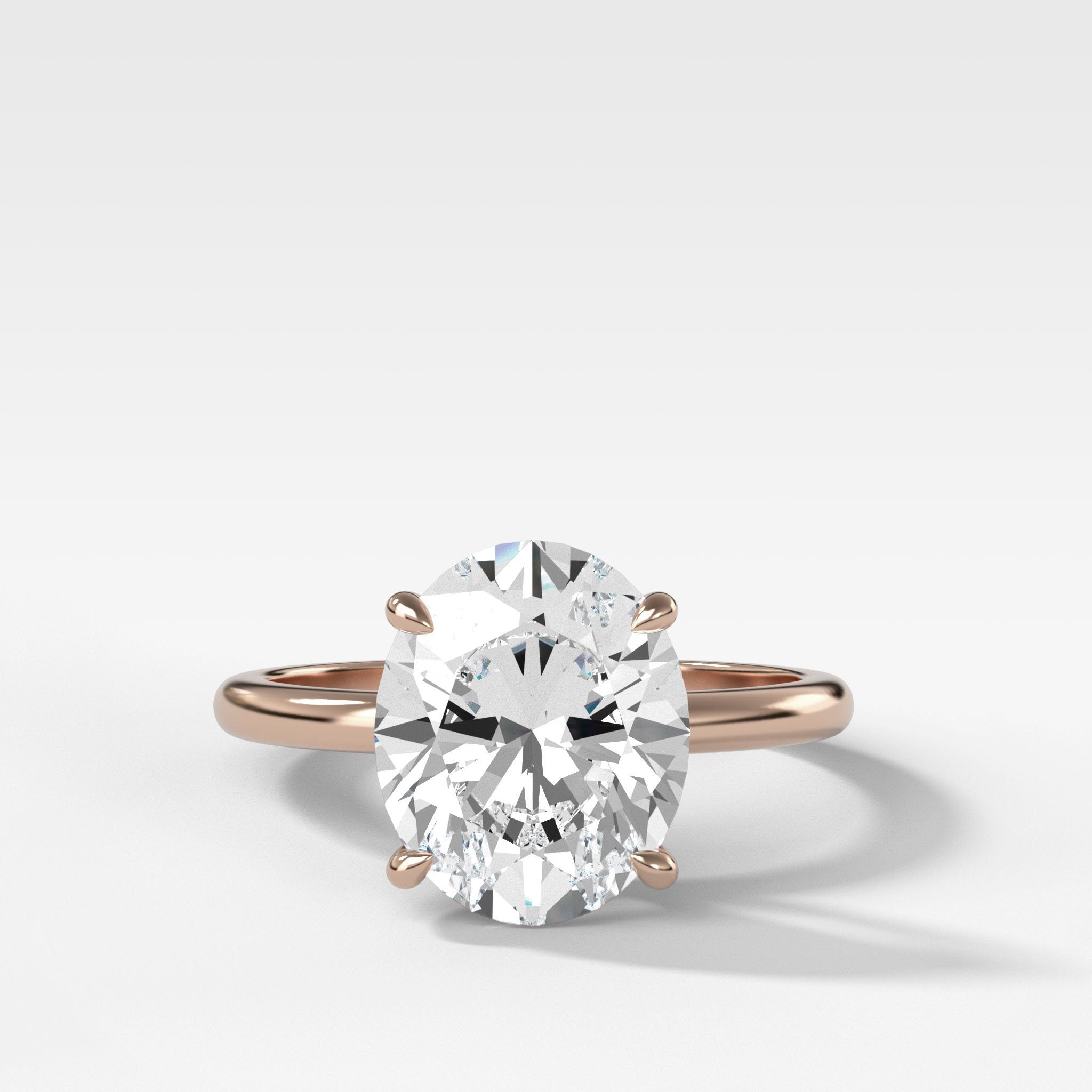 Crescent Solitaire Engagement Ring With Oval Cut Diamond