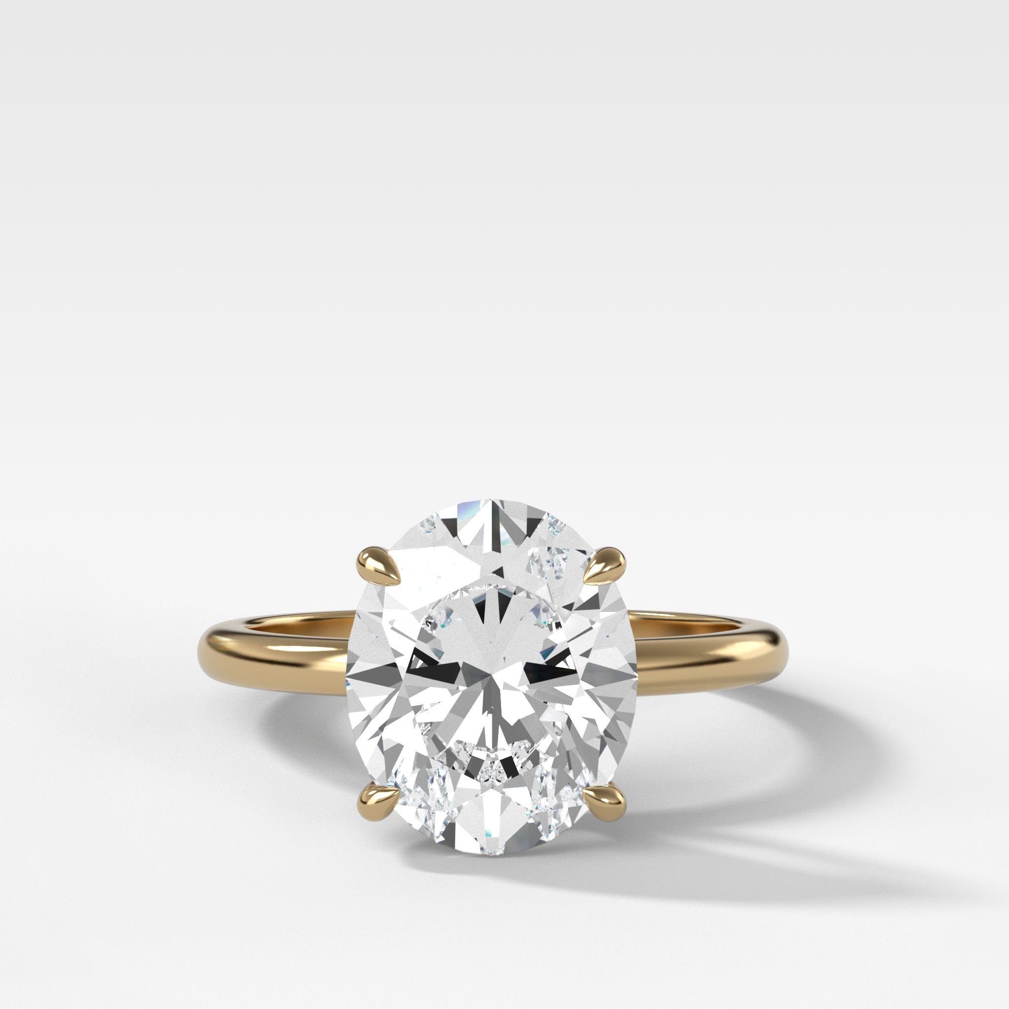 Crescent Solitaire Engagement Ring With Oval Cut Diamond