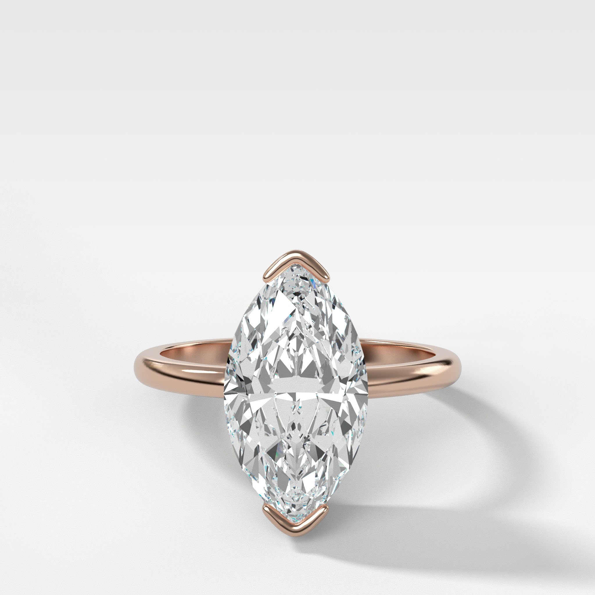 North South Half Bezel Solitaire Engagement Ring With Marquise Cut Diamond