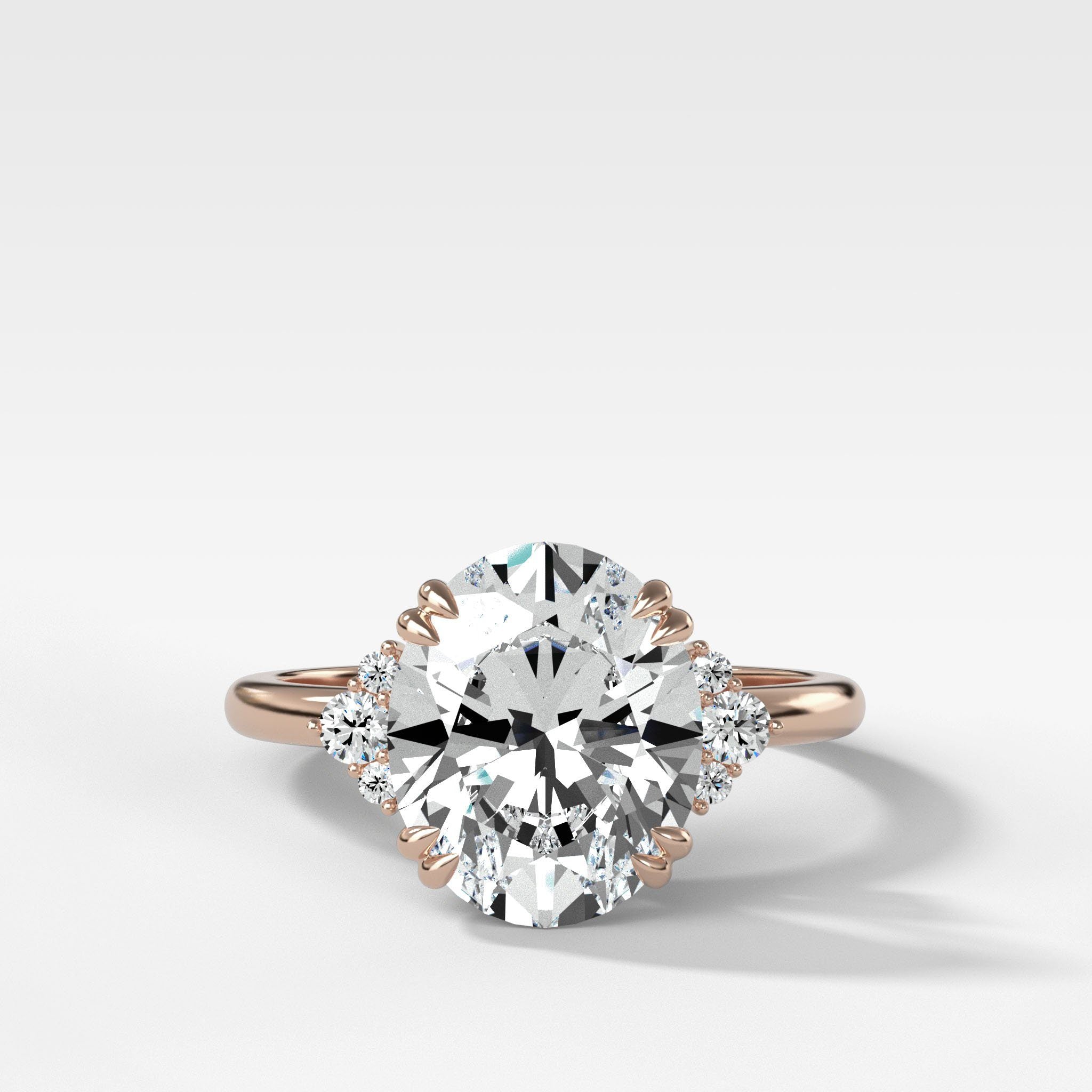 Signature Cluster Engagement Ring With Oval Cut Diamond