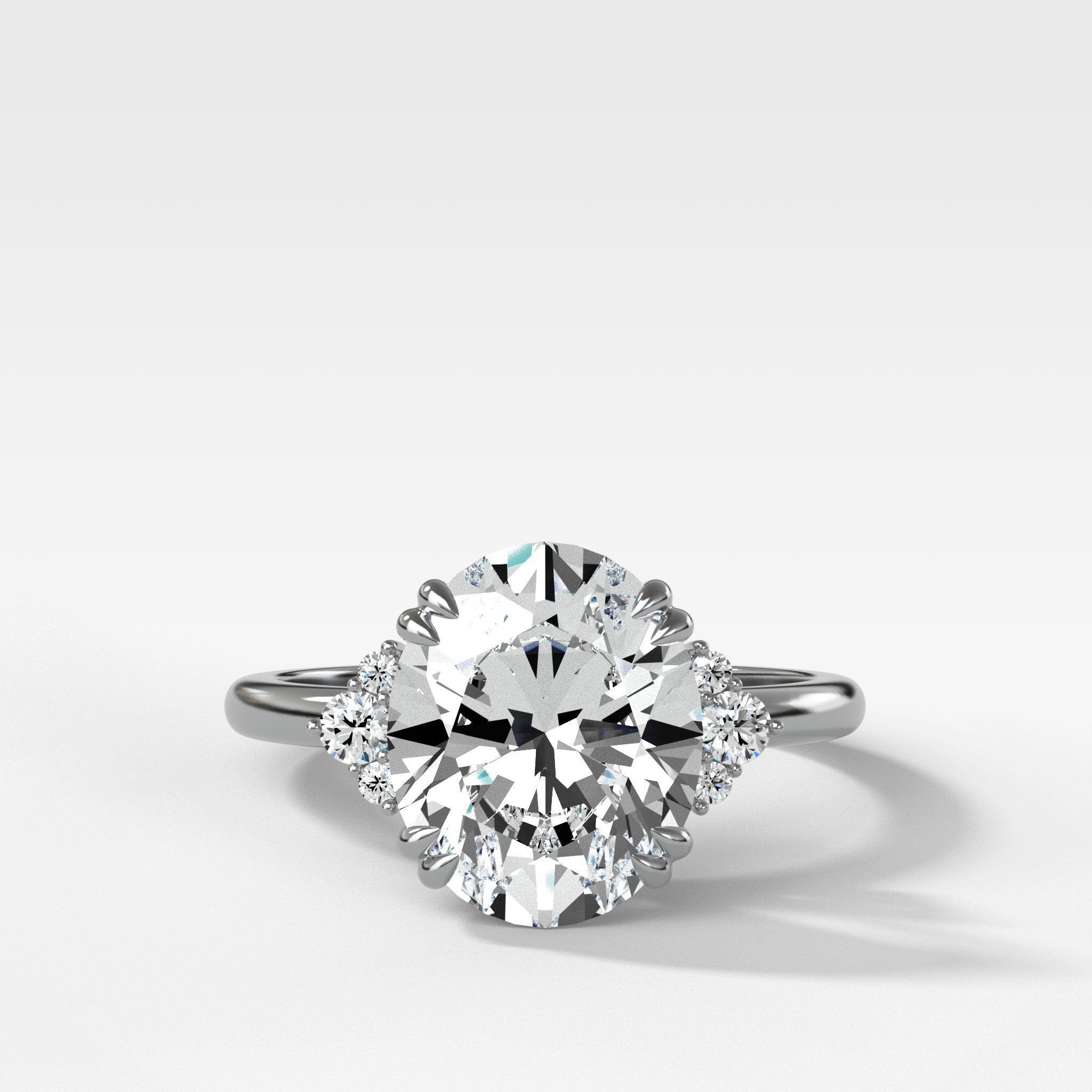 Signature Cluster Engagement Ring With Oval Cut Diamond