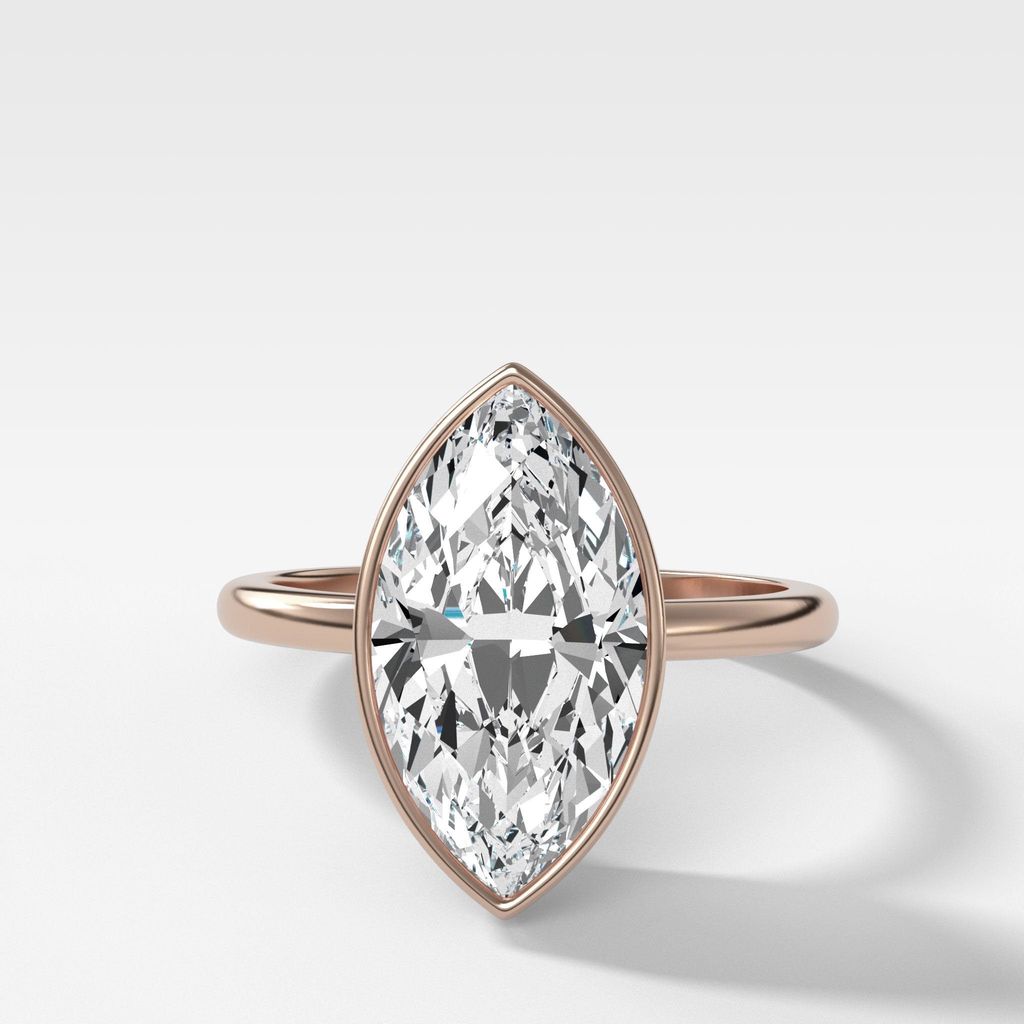 Penumbra Bezel Set Engagement Ring With Marquise Cut