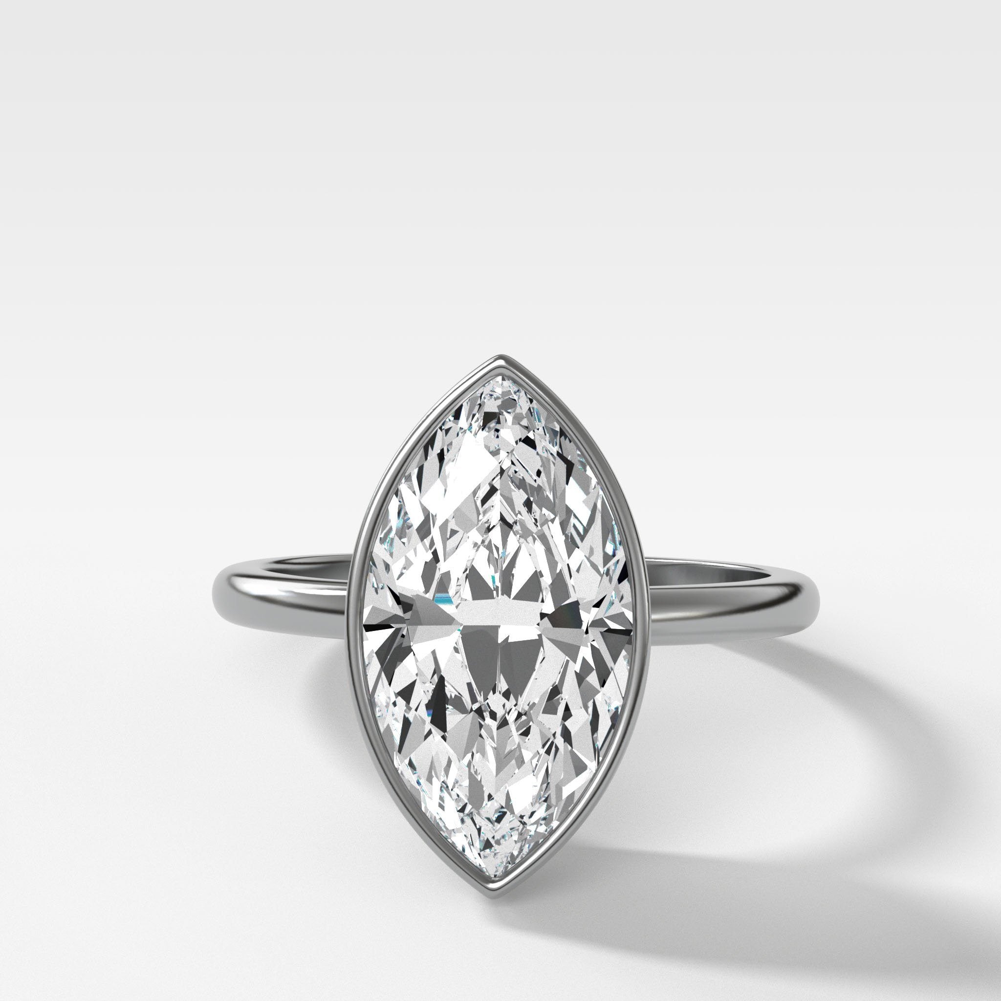 Penumbra Bezel Set Engagement Ring With Marquise Cut