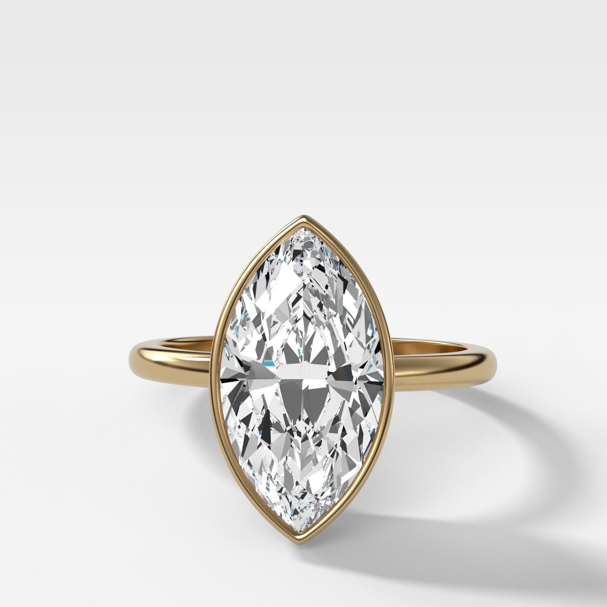 Penumbra Bezel Set Engagement Ring With Marquise Cut
