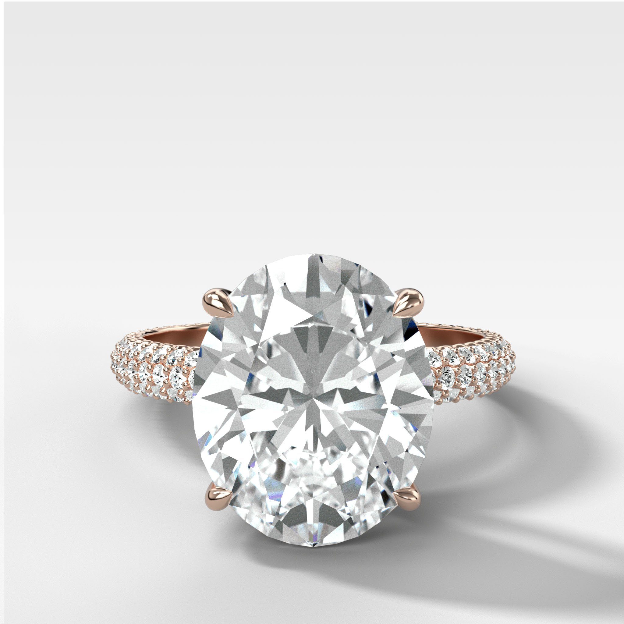 Triple Row Pavé Engagement Ring With Oval Cut Diamond