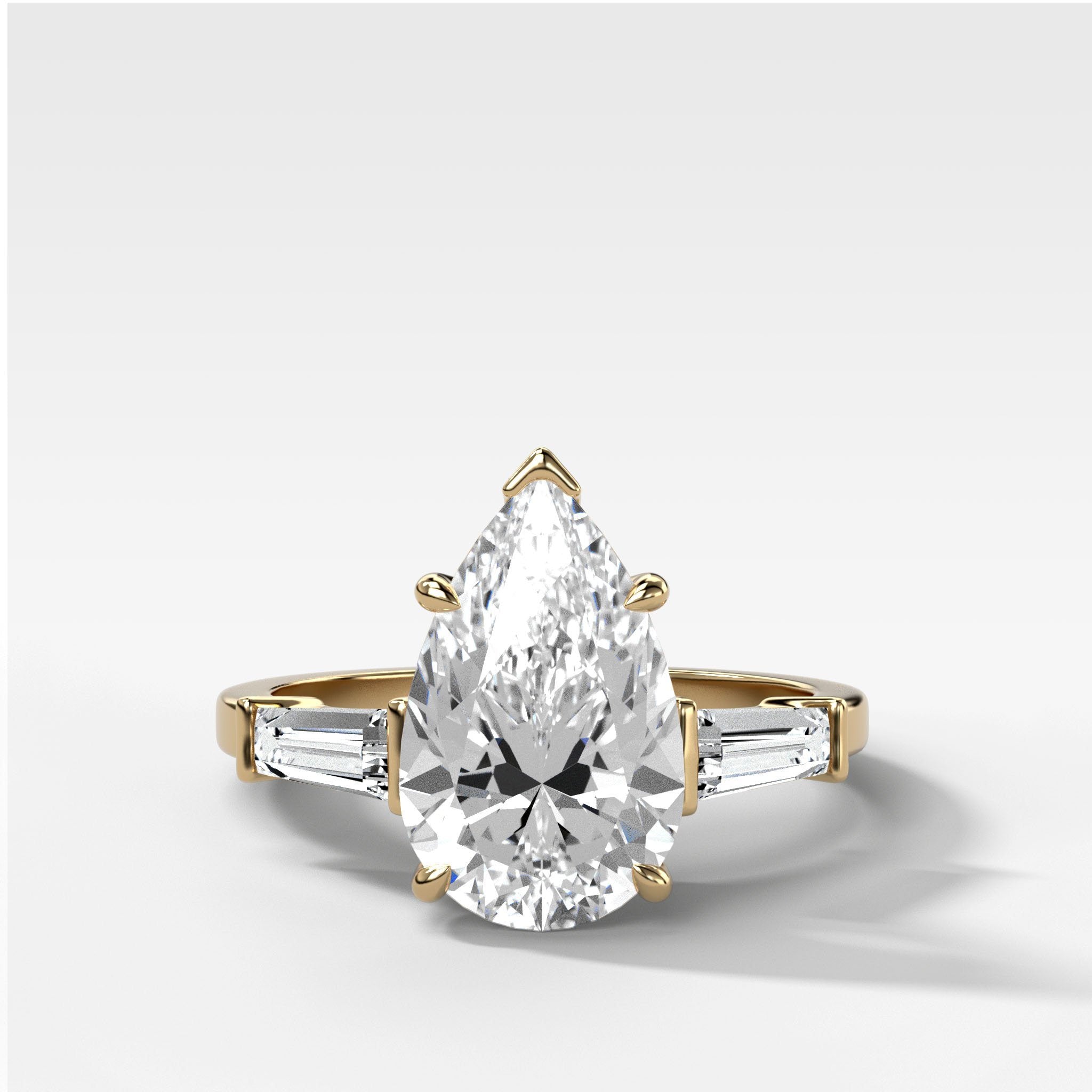 Translunar Tapered Baguette Engagement Ring With Pear Cut Diamond
