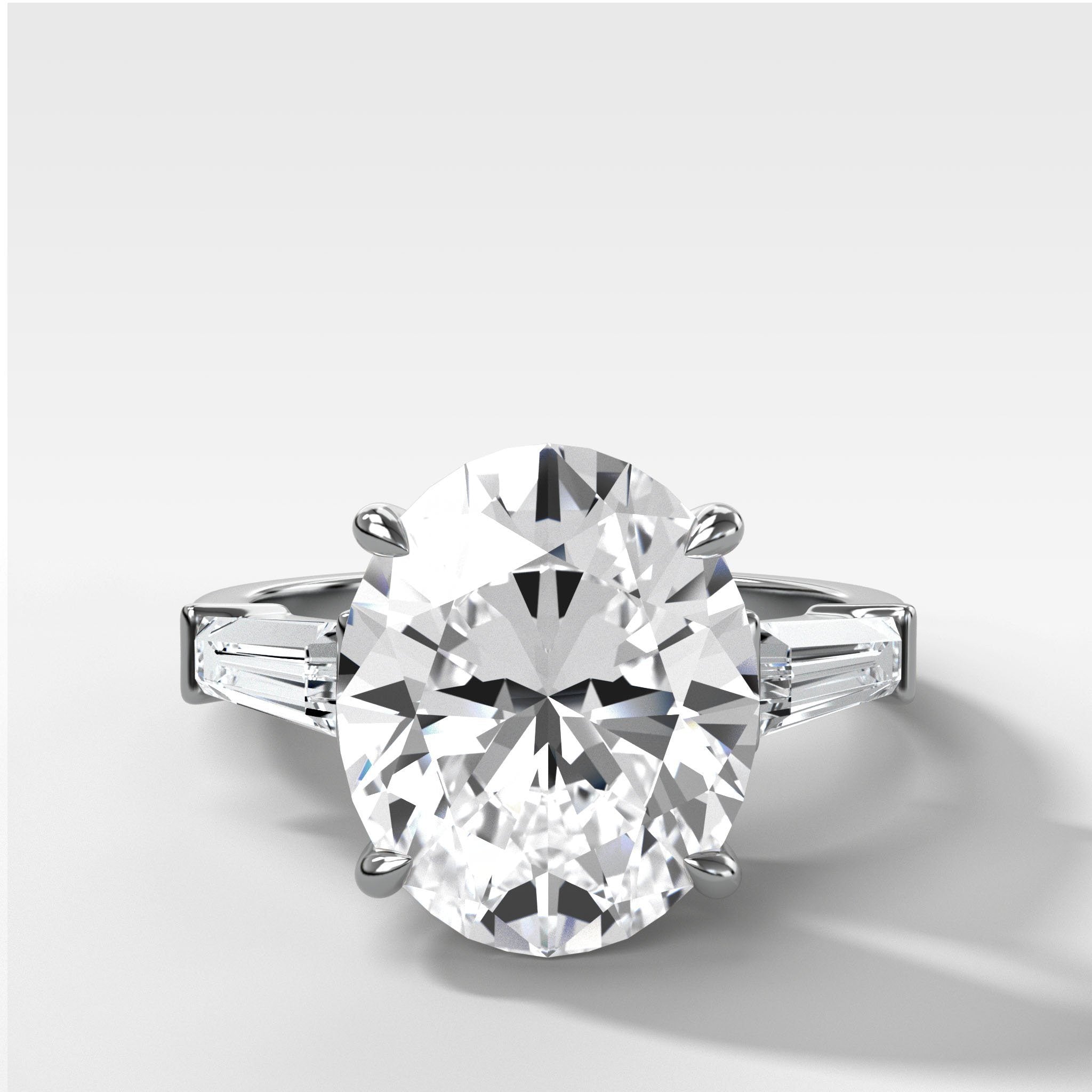 Translunar Tapered Baguette Engagement Ring With Oval Cut Diamond