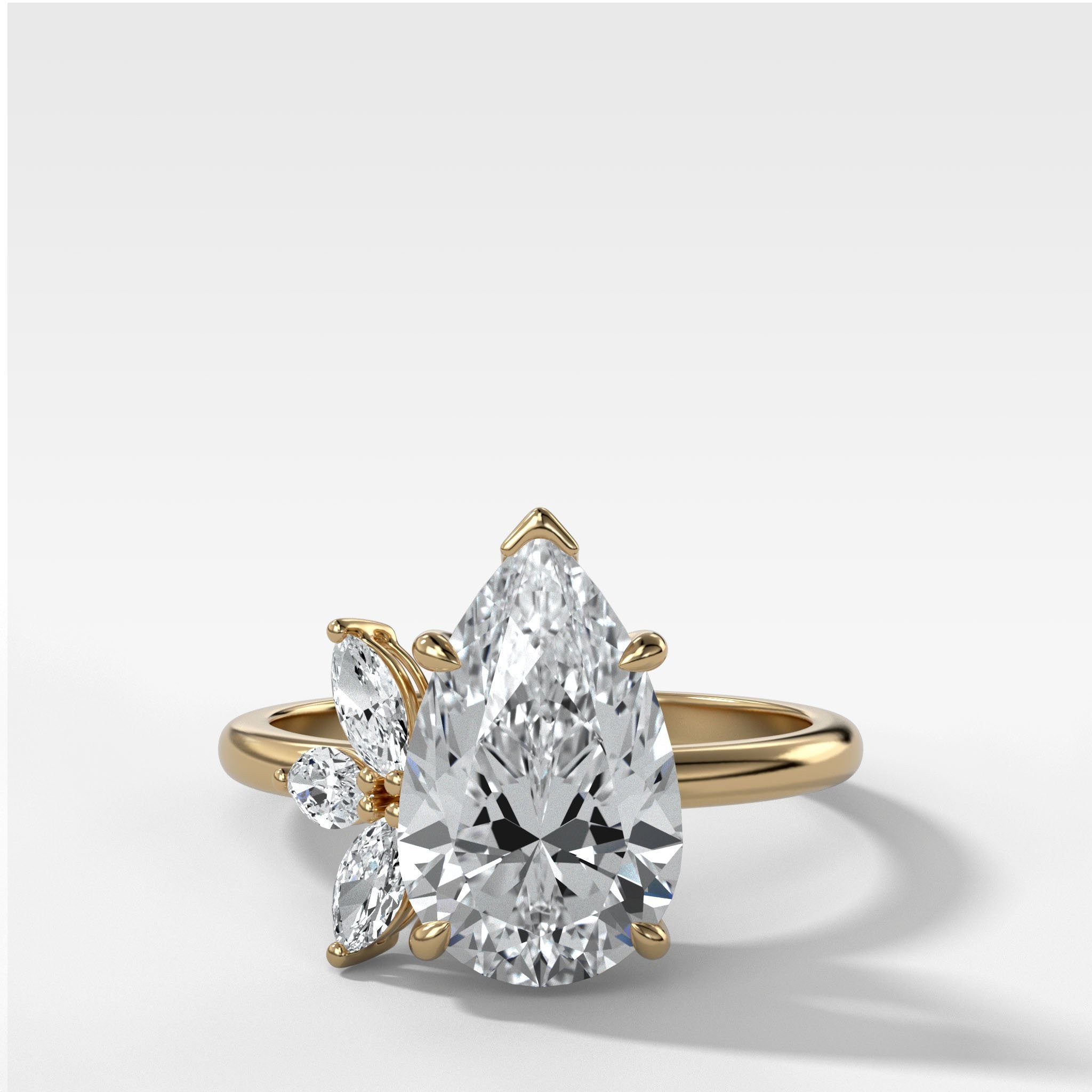 Lotus Engagement Ring With Pear Cut Diamond