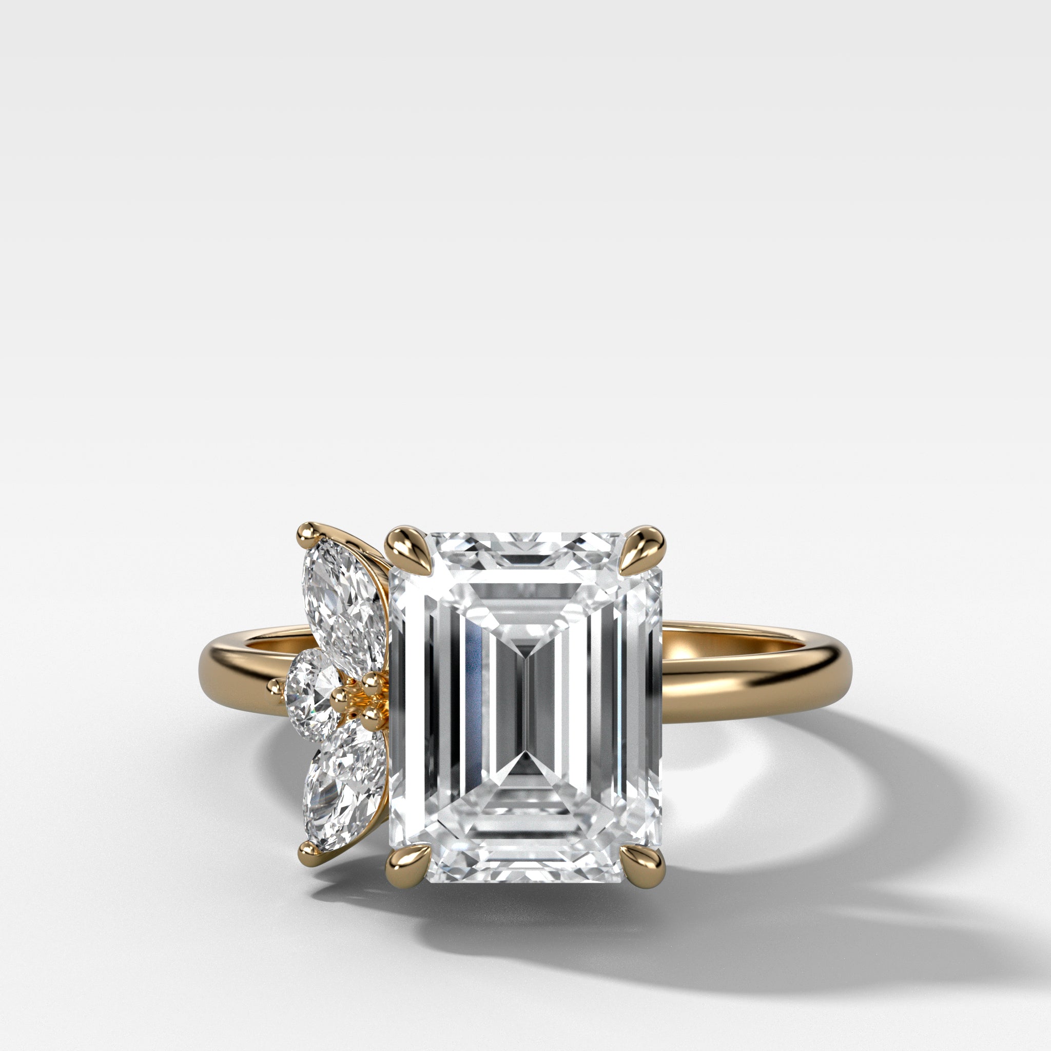 Lotus Engagement Ring With Emerald Cut Diamond