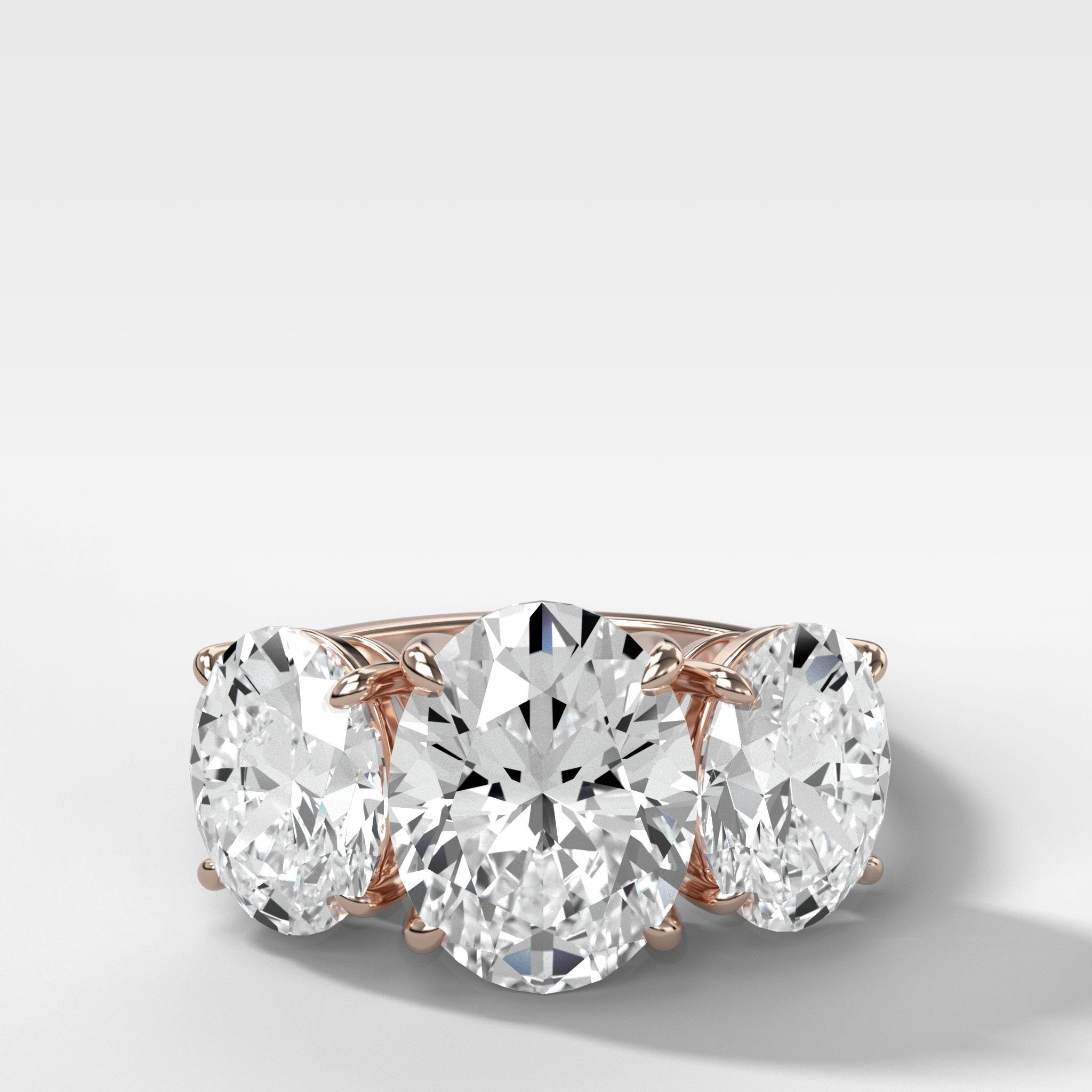 Triad Engagement Ring With Oval Cut Diamonds
