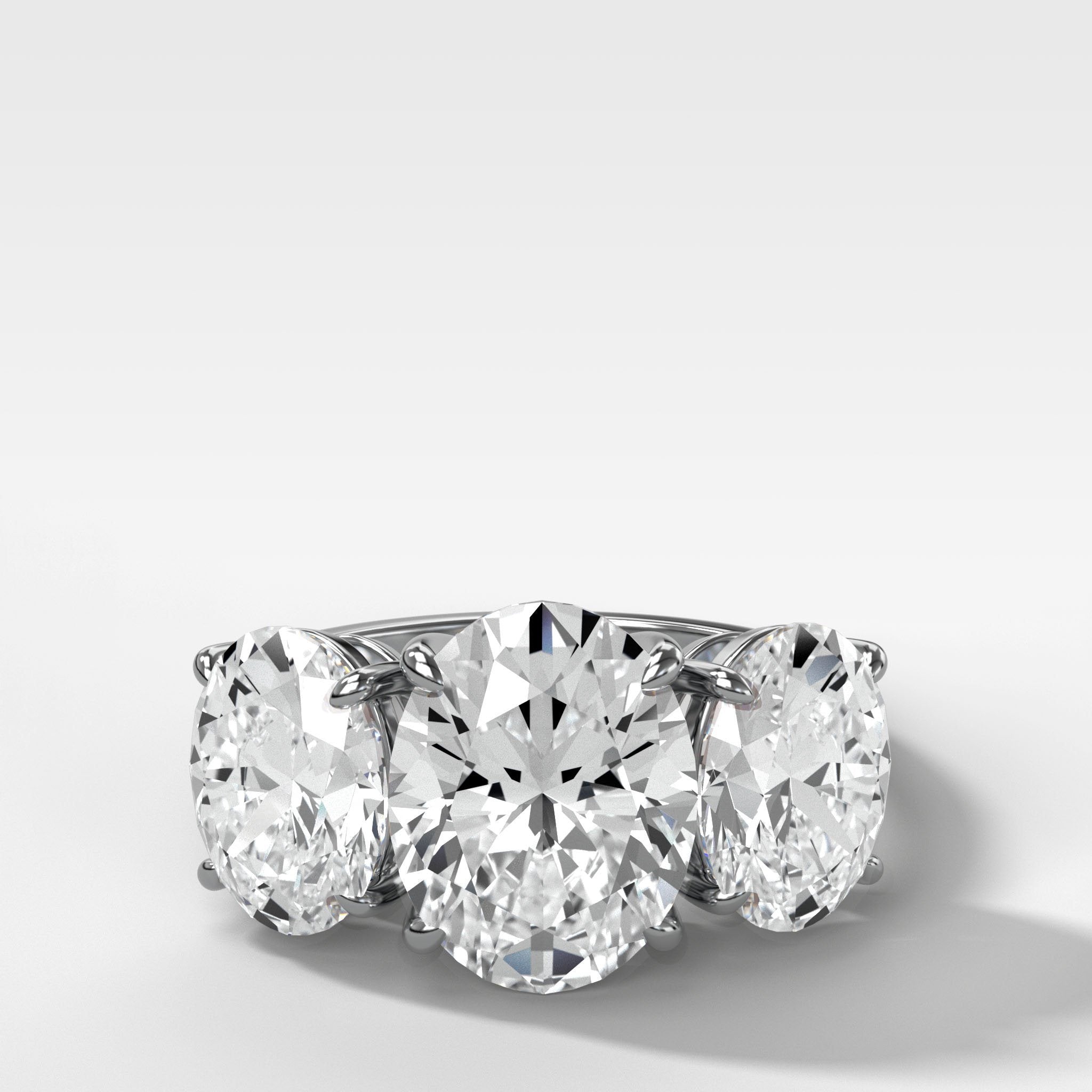 Triad Engagement Ring With Oval Cut Diamonds