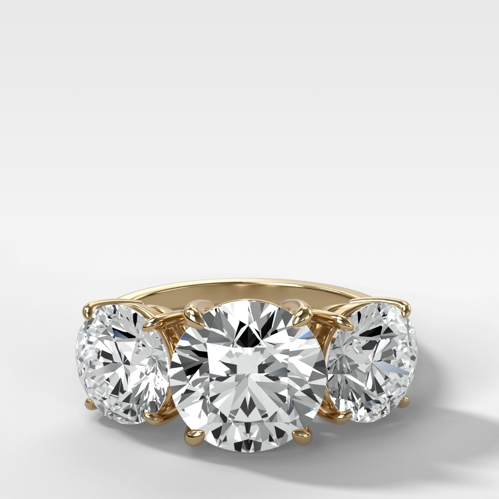 Triad Engagement Ring With Round Cut Diamonds