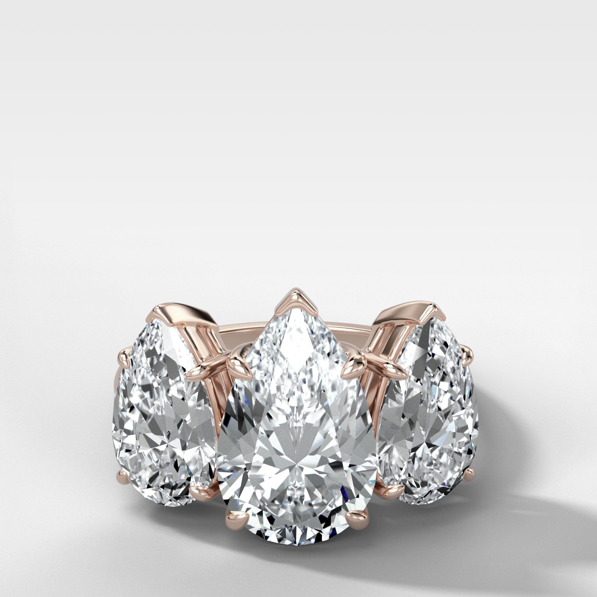 Triad Engagement Ring With Pear Cut Diamonds