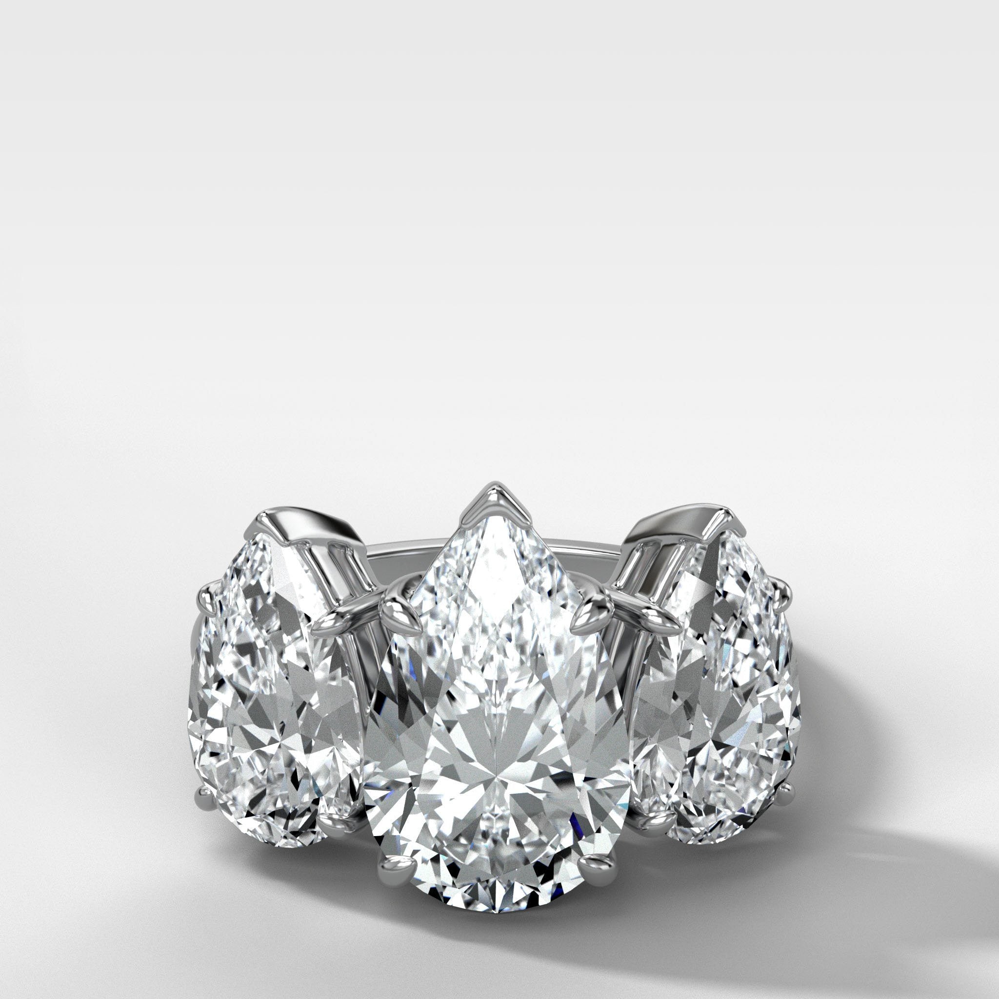 Triad Engagement Ring With Pear Cut Diamonds