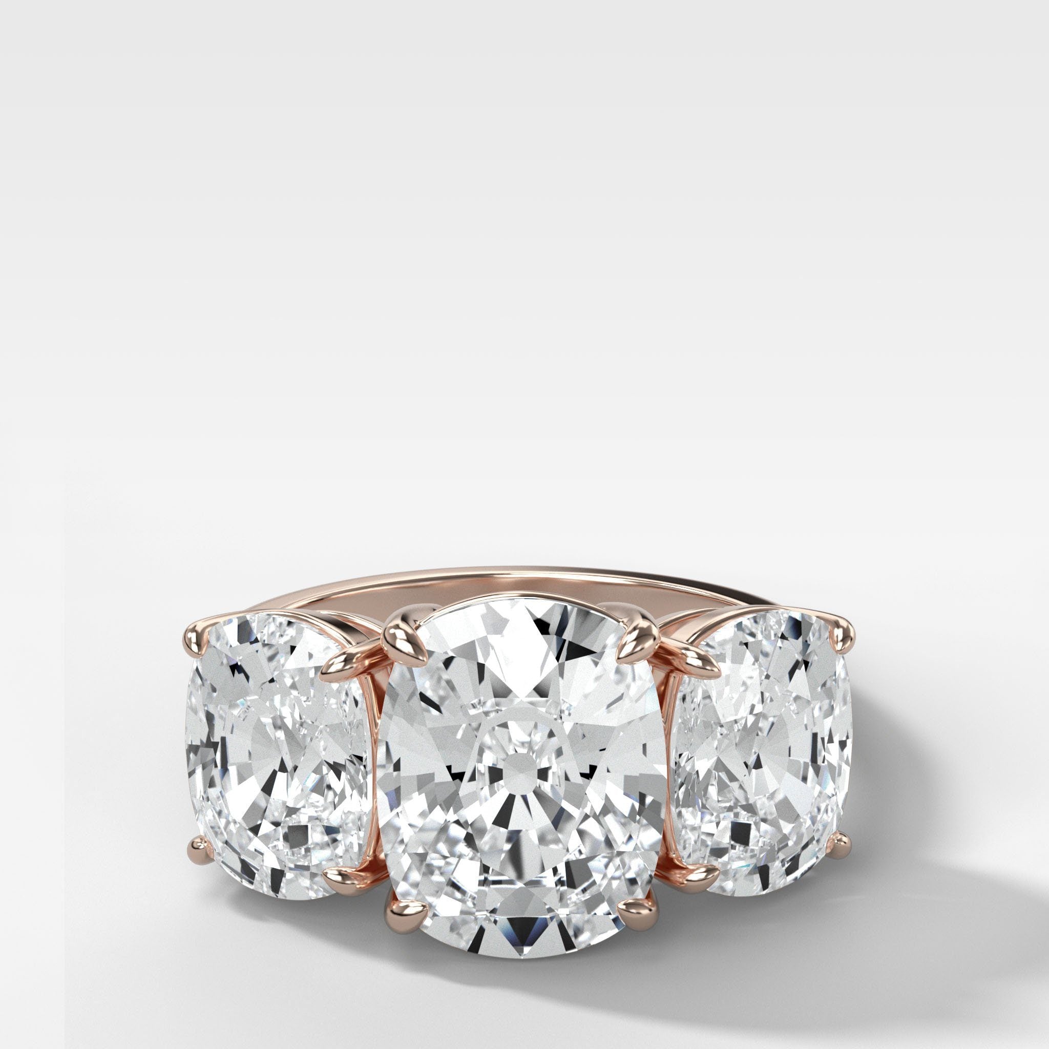 Triad Engagement Ring With Elongated Cushion Cut Diamonds