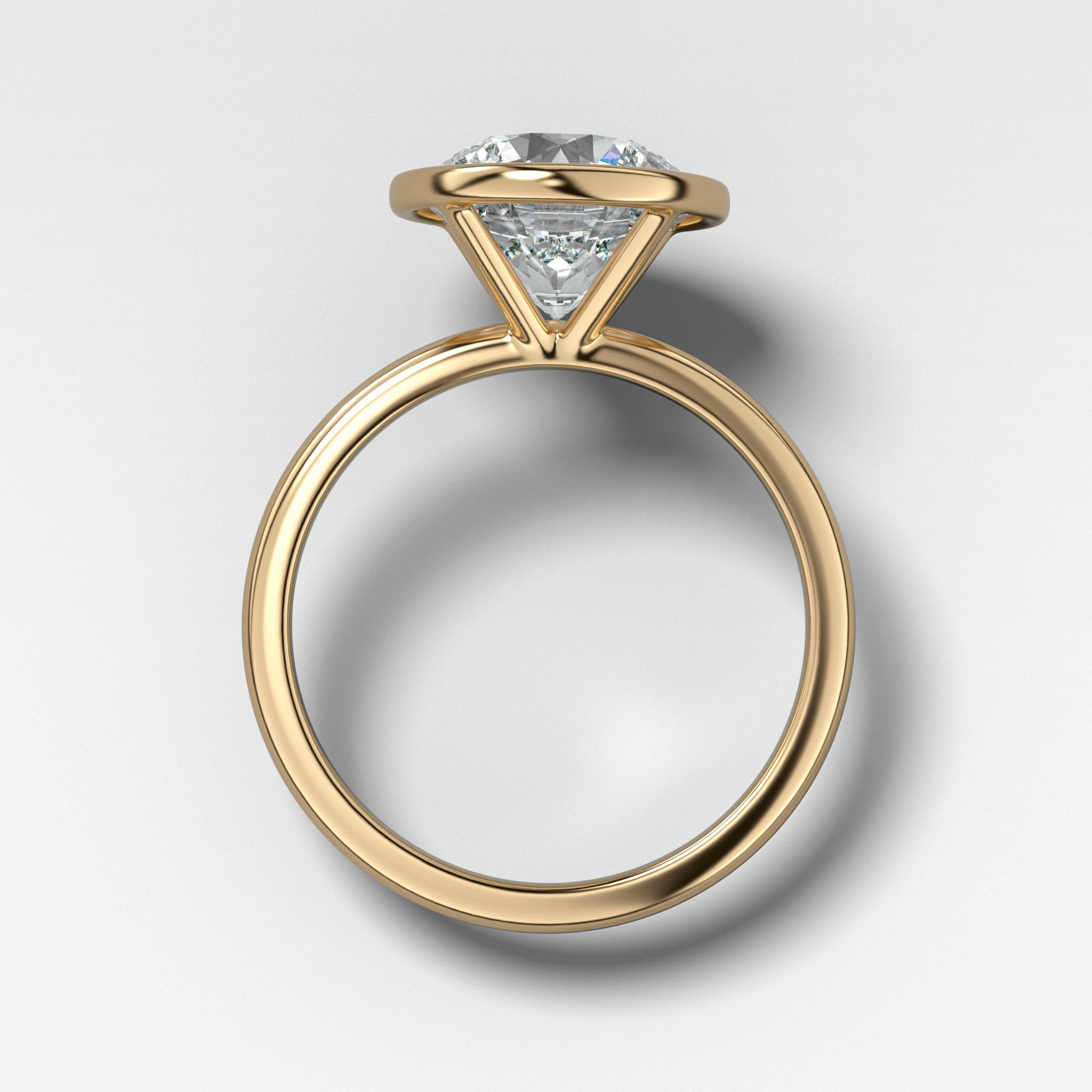 Penumbra Bezel Set Engagement Ring With Round Cut