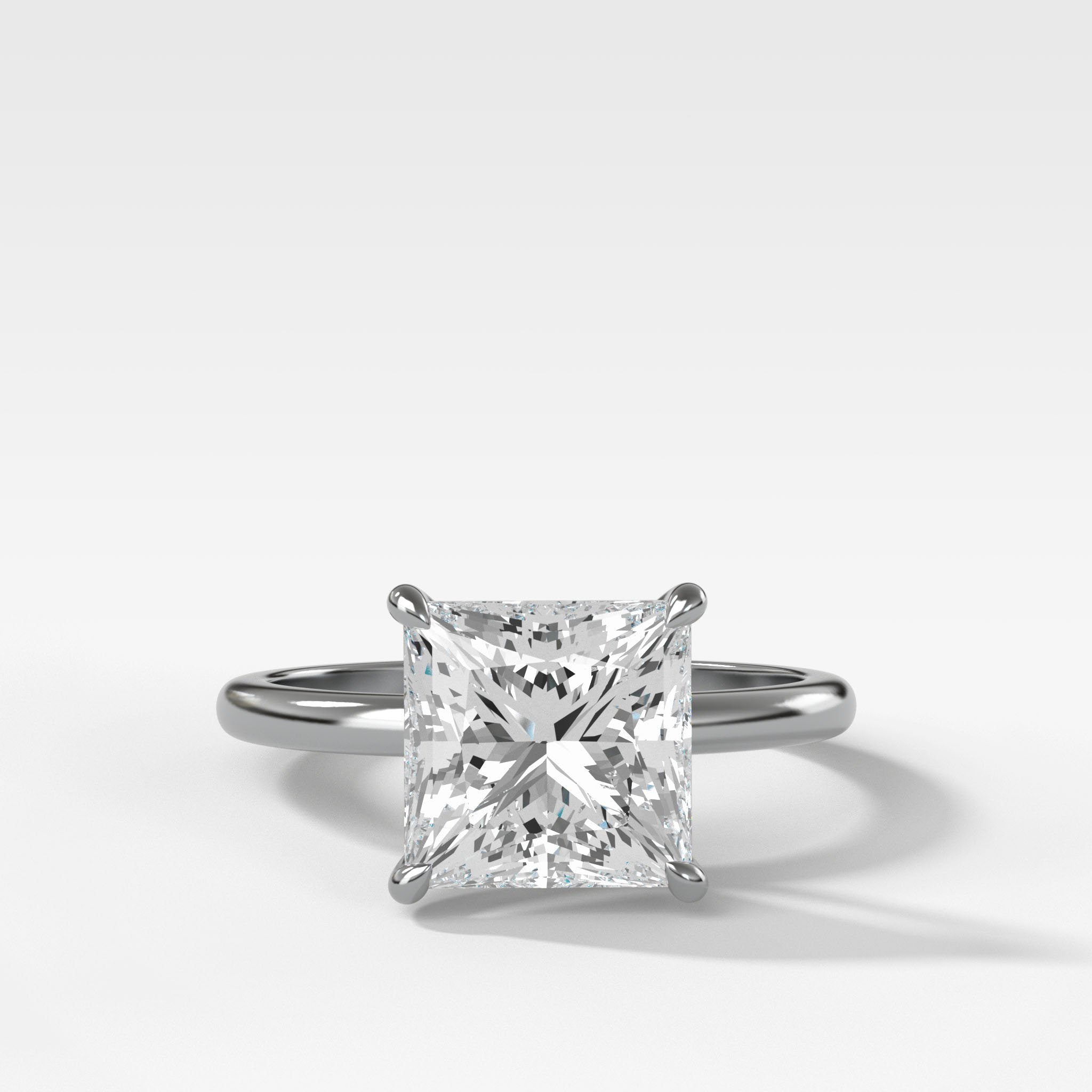 Crescent Solitaire Engagement Ring With Princess Cut Diamond