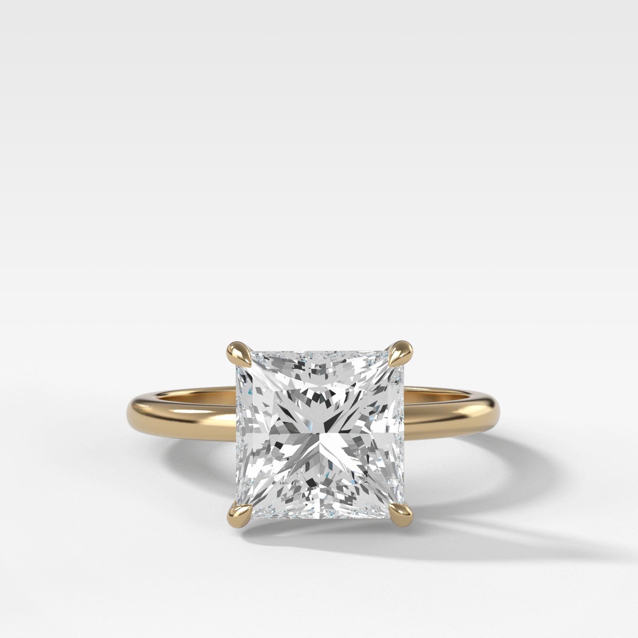 Crescent Solitaire Engagement Ring With Princess Cut Diamond