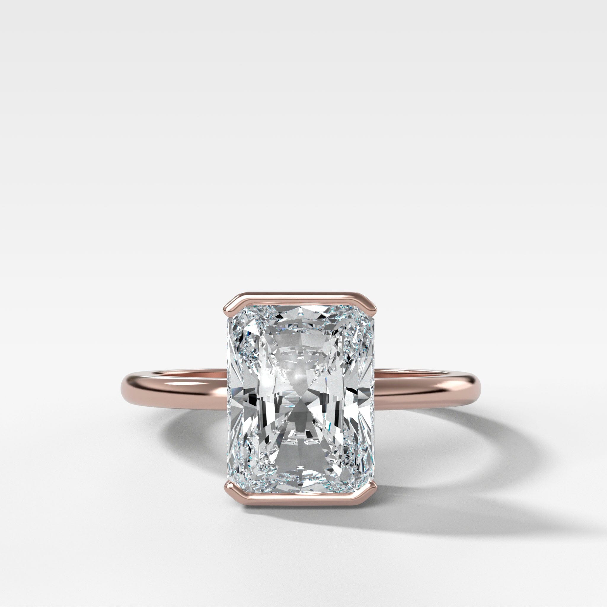 North South Half Bezel Solitaire Engagement Ring With Elongated Radiant Cut Diamond