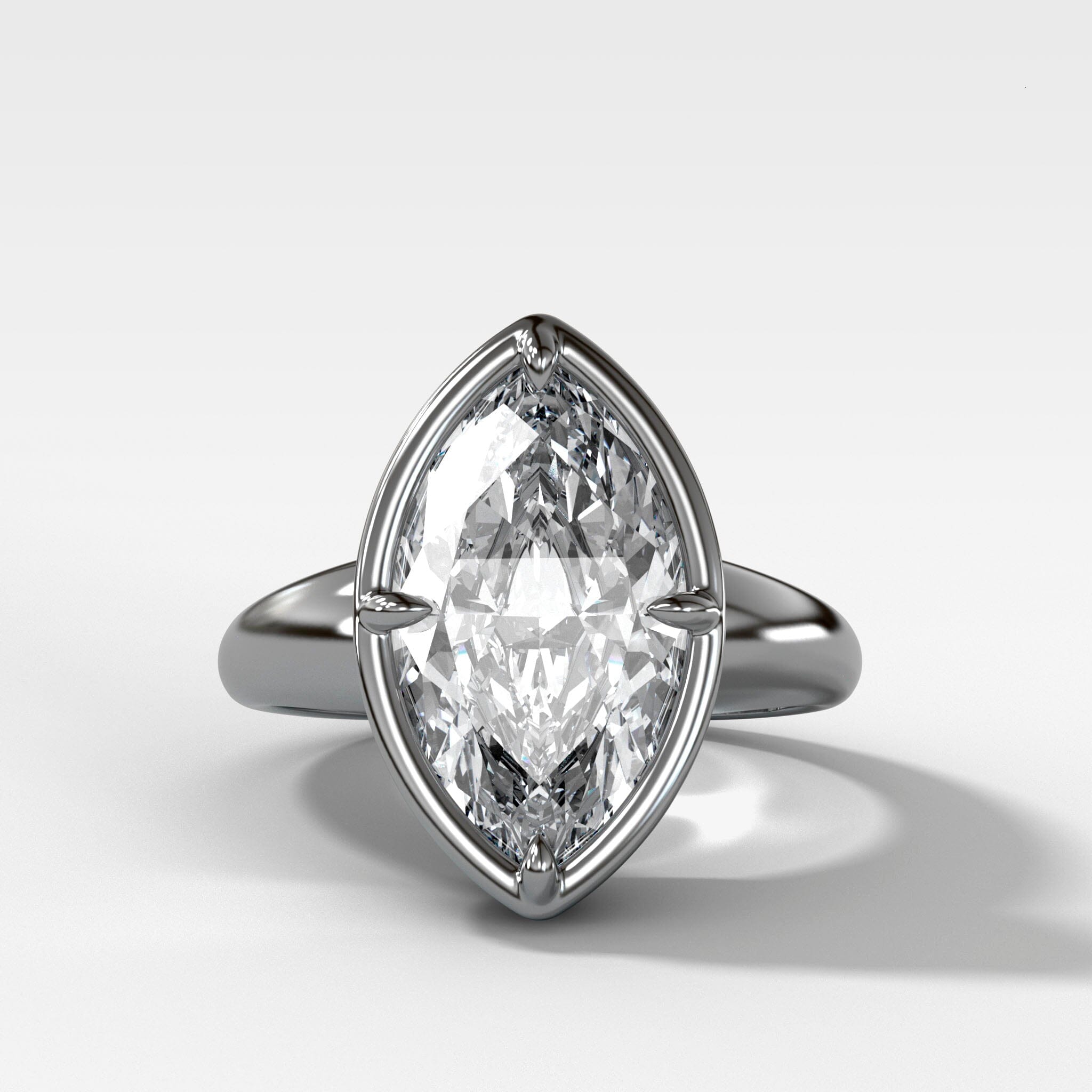 Club Ring Solitaire Engagement Ring With a Marquise Cut Diamond