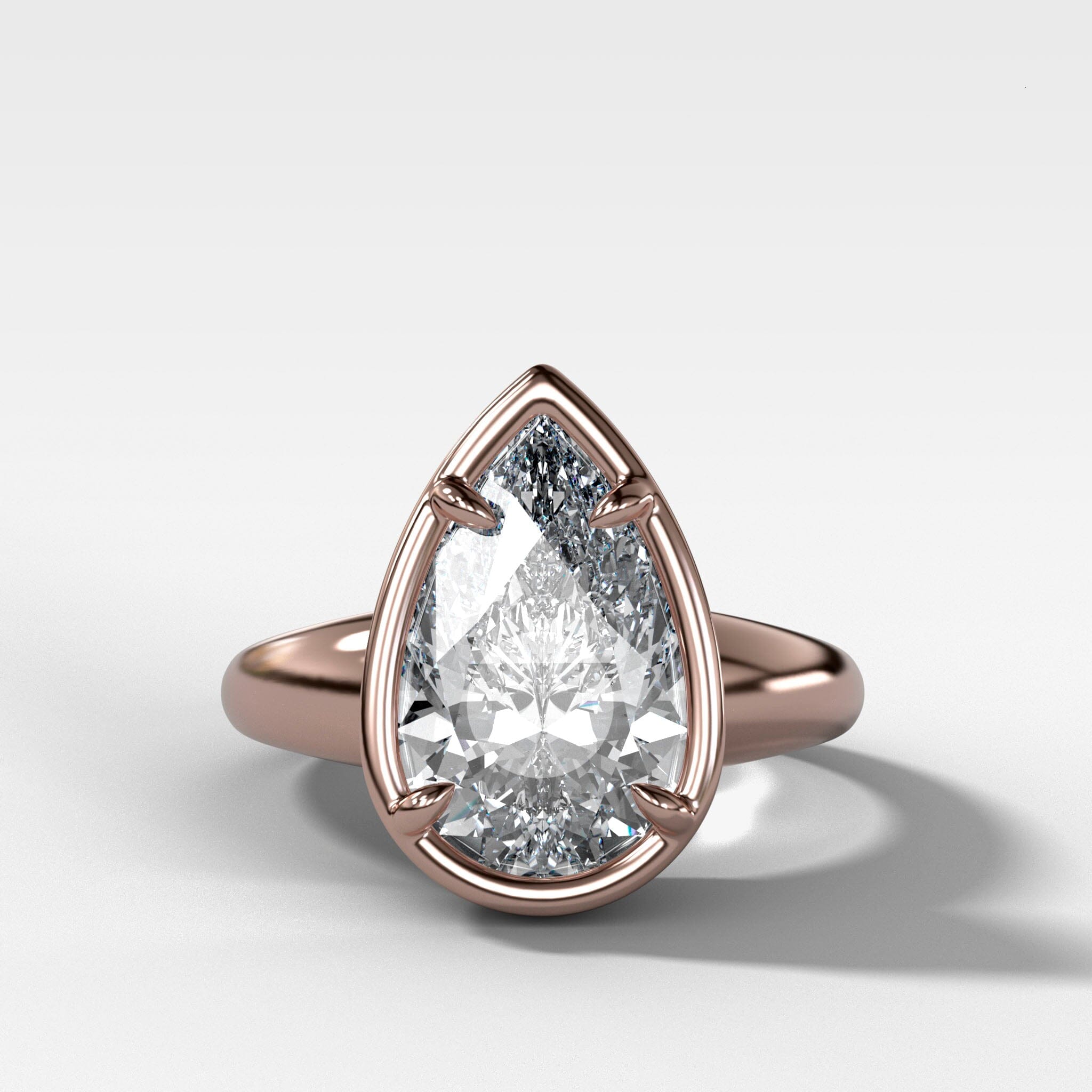 Club Ring Solitaire Engagement Ring With a Pear Cut Diamond