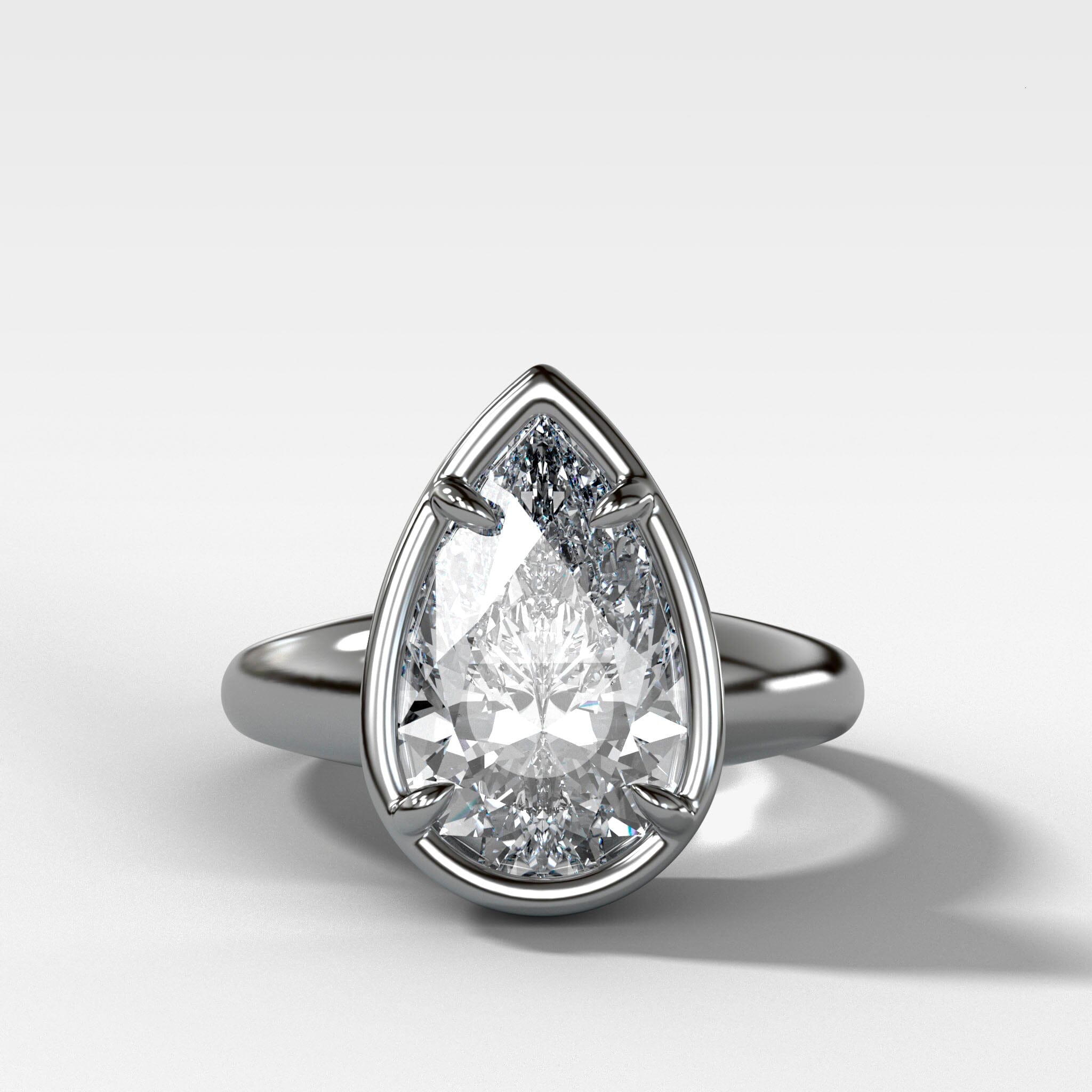 Club Ring Solitaire Engagement Ring With a Pear Cut Diamond