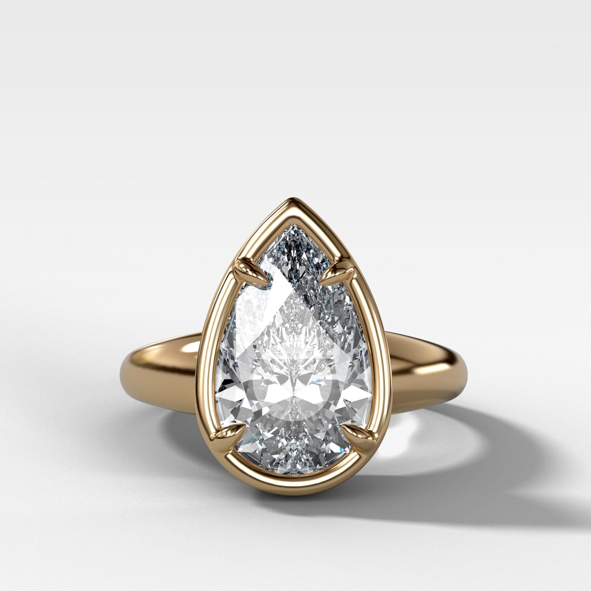 Club Ring Solitaire Engagement Ring With a Pear Cut Diamond