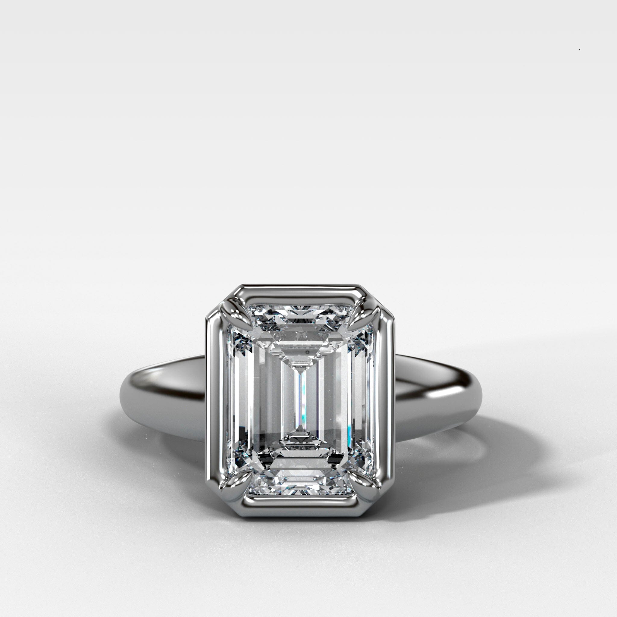Club Ring Solitaire Engagement Ring With an Emerald Cut Diamond