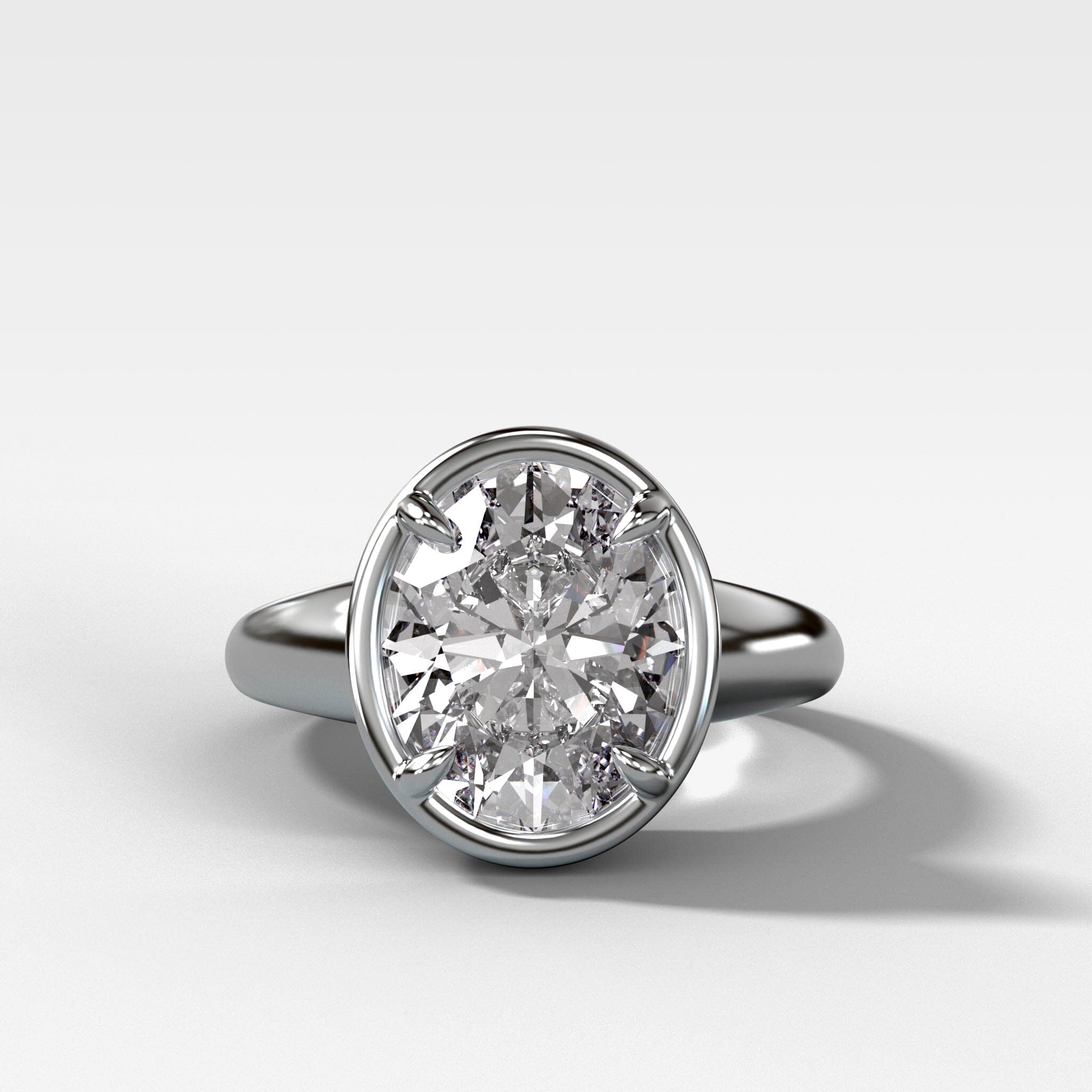 Club Ring Solitaire Engagement Ring With an Oval Cut Diamond