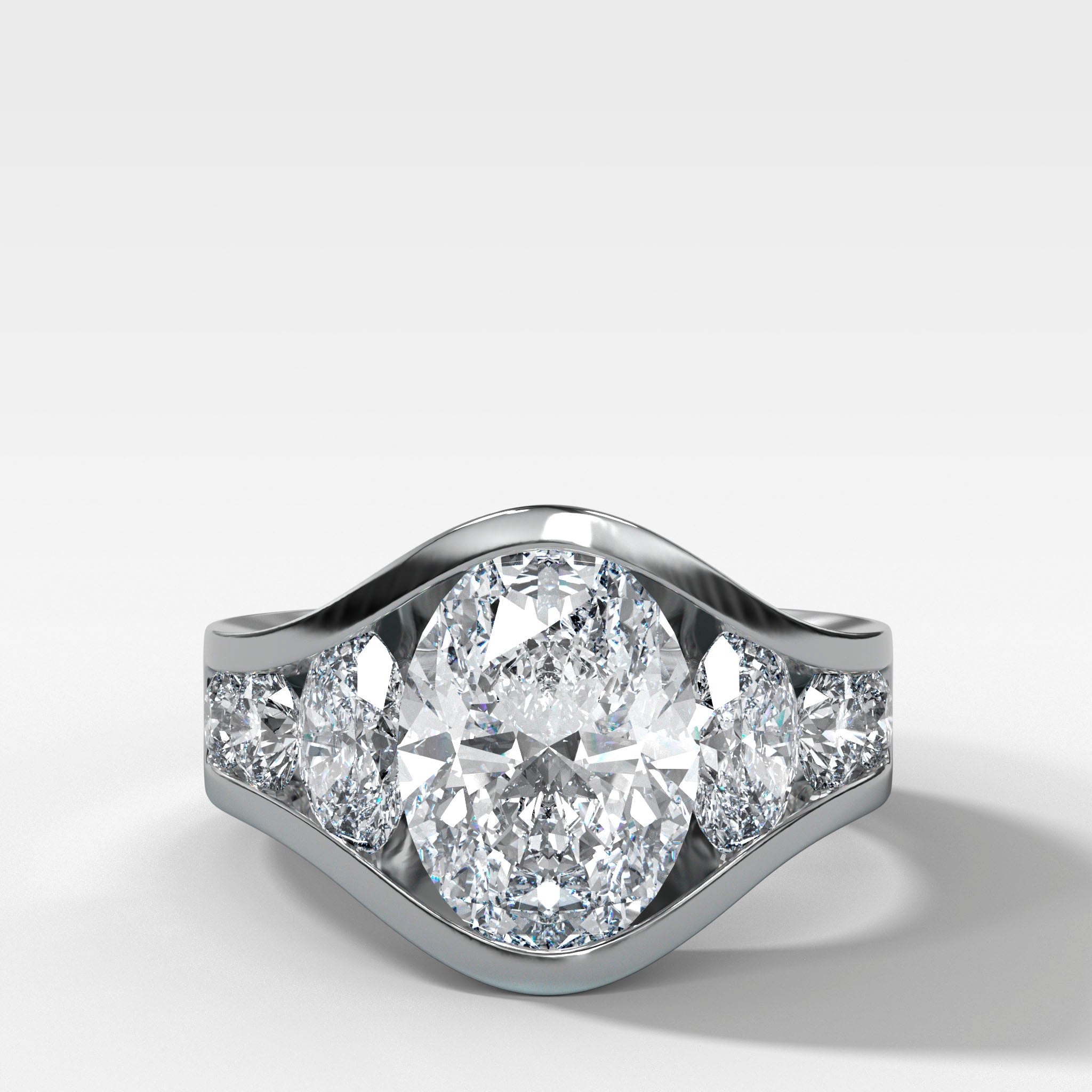 Full Channel Set Engagement Ring with Oval and Round Diamonds