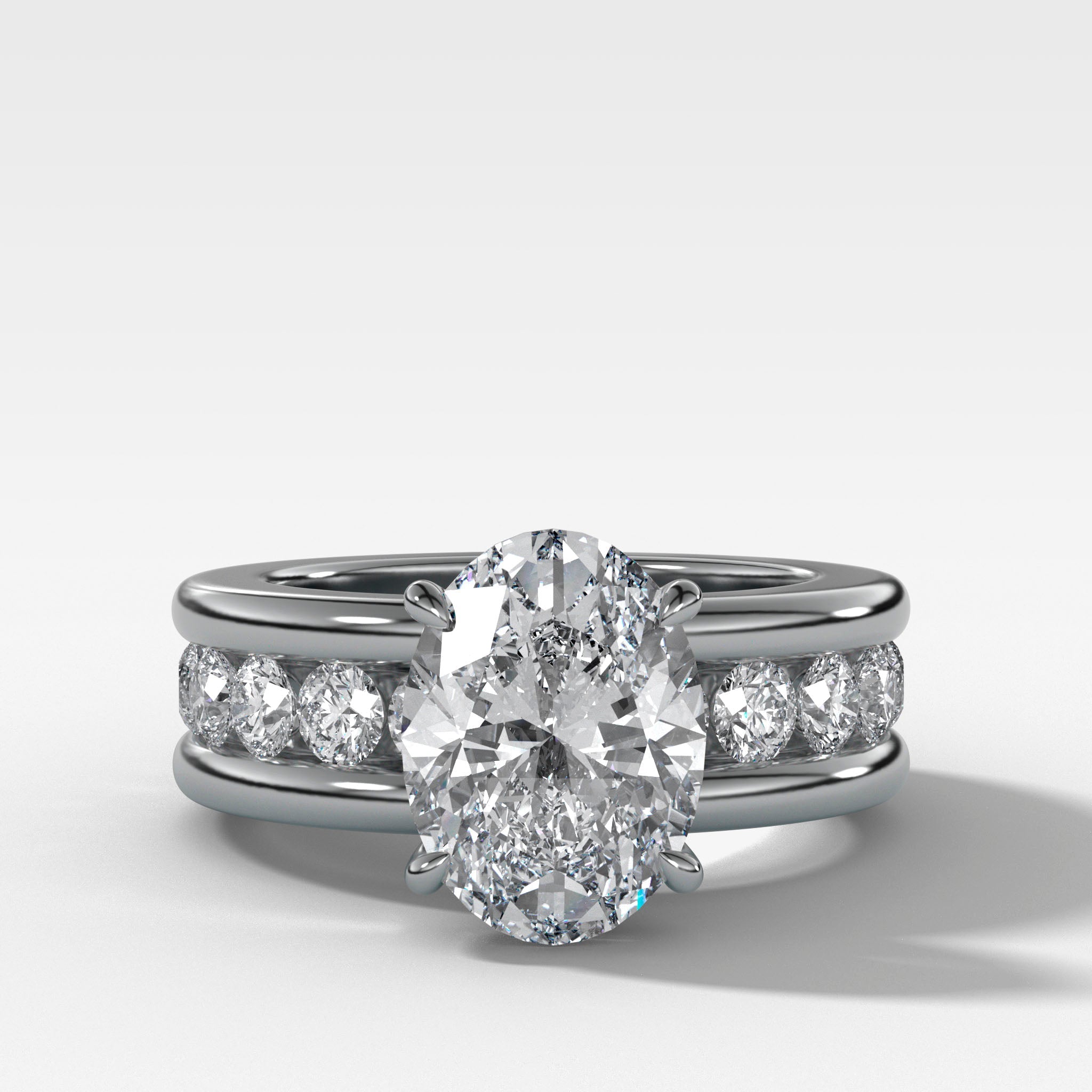 Chunky Channel Set Engagement Ring with Oval Cut Diamond