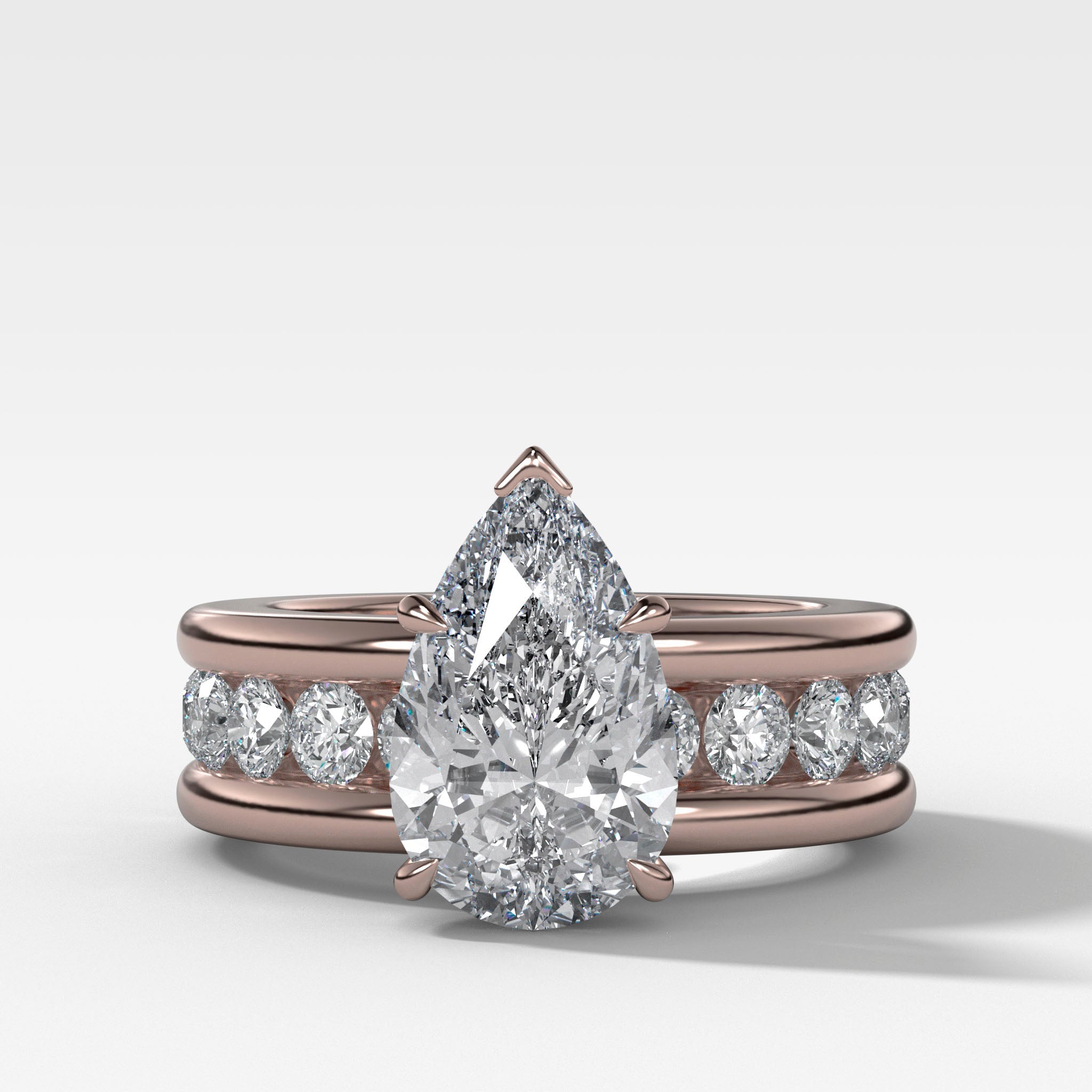 Chunky Channel Set Engagement Ring with Pear Cut Diamond