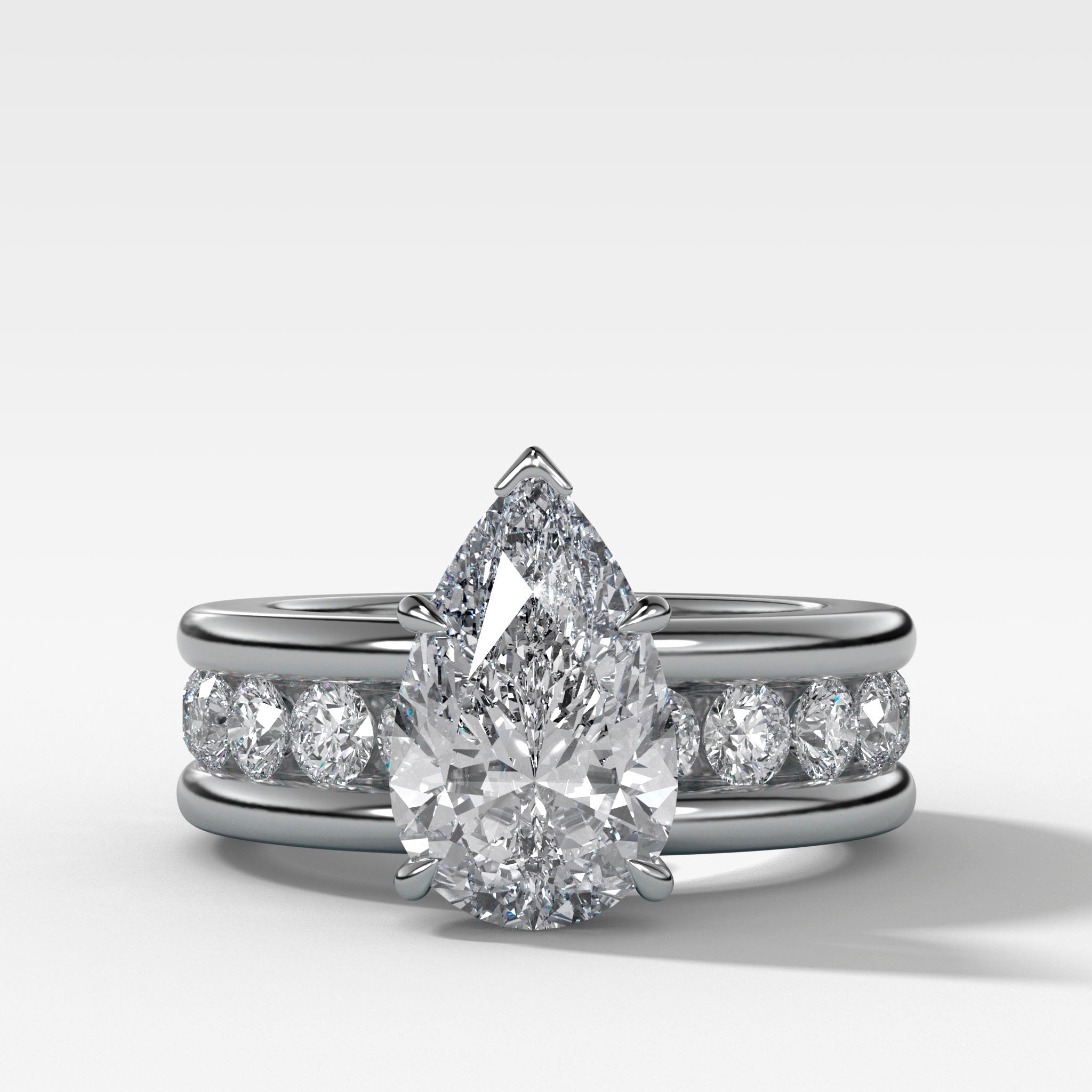 Chunky Channel Set Engagement Ring with Pear Cut Diamond