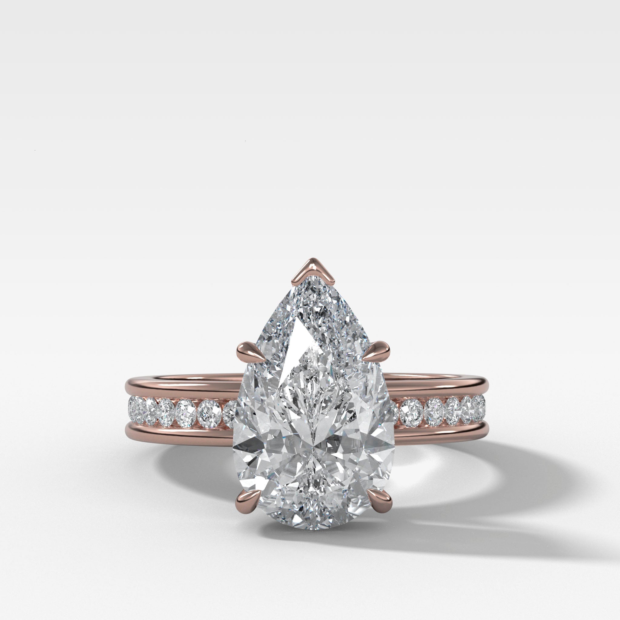 Petite Channel Set Engagement Ring with Pear Cut Diamond