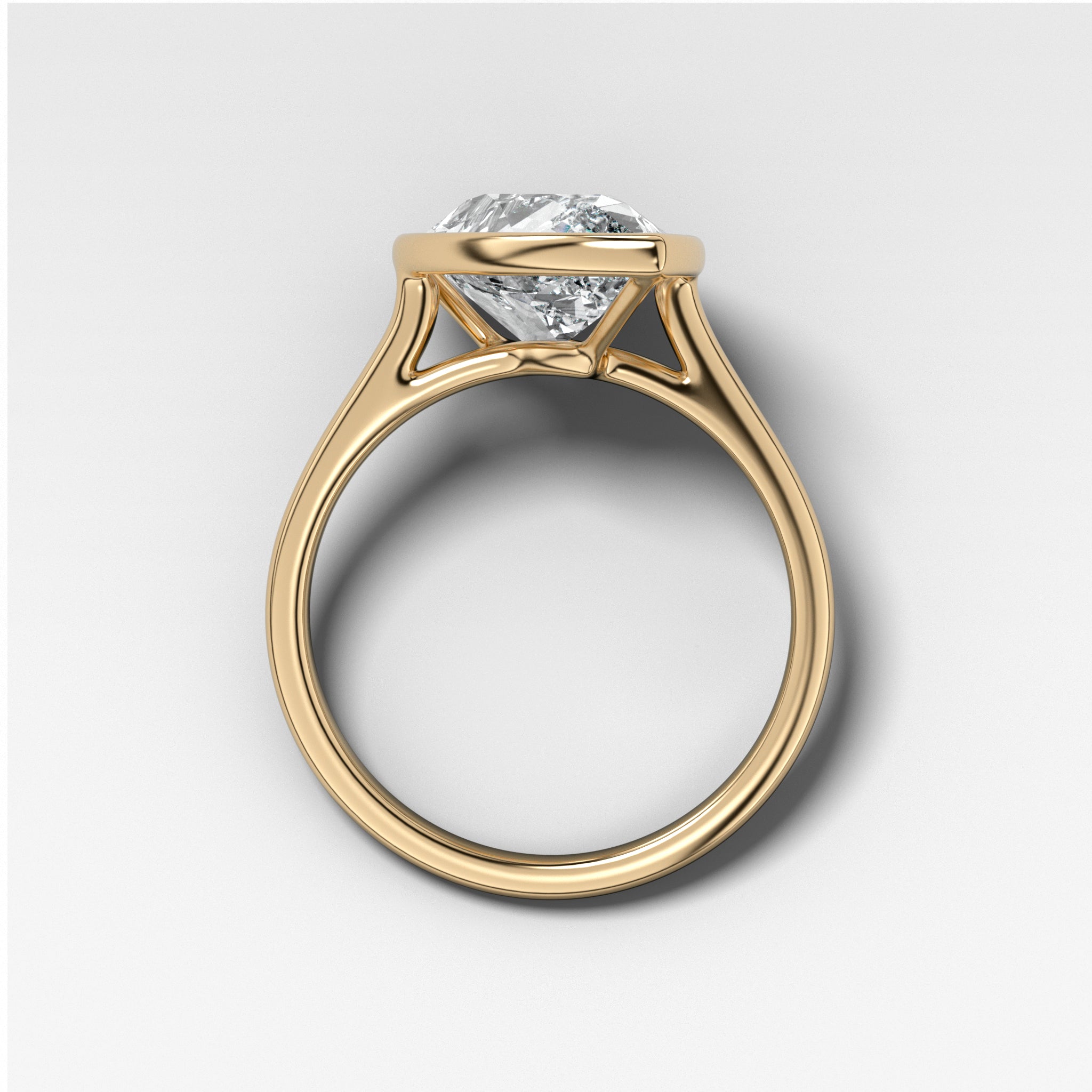 Penumbra Bezel Set Engagement Ring With Tilted Pear Cut