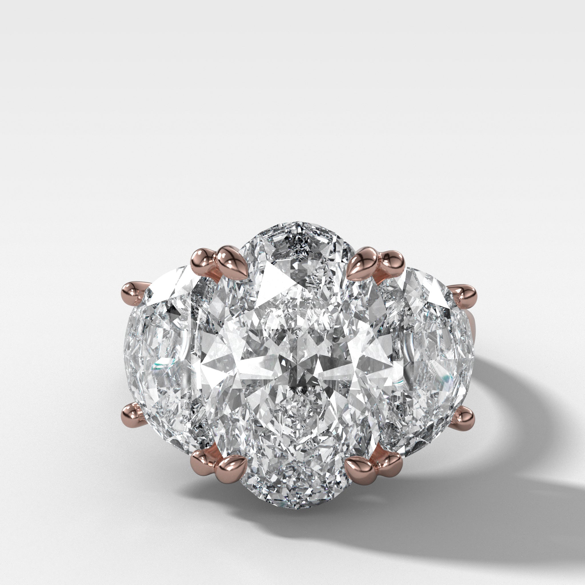Jumbo Three Stone ring with Half Moon sides & an Oval Cut
