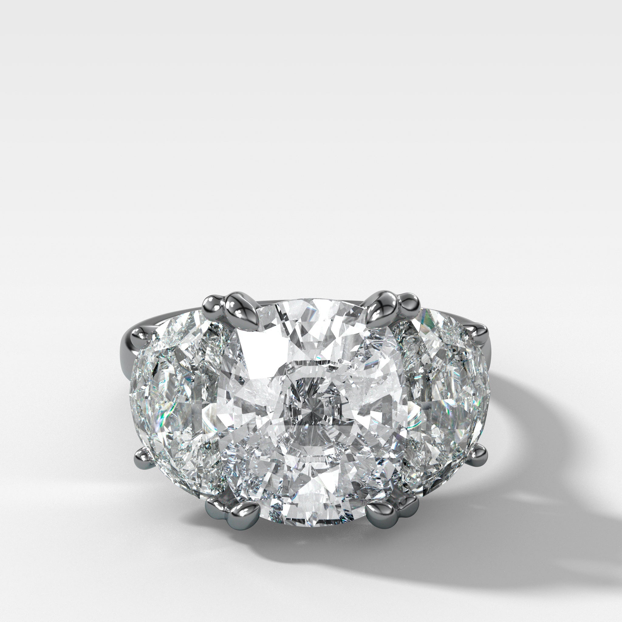 Jumbo Three Stone ring with Half Moon sides & an Elongated Cushion Cut