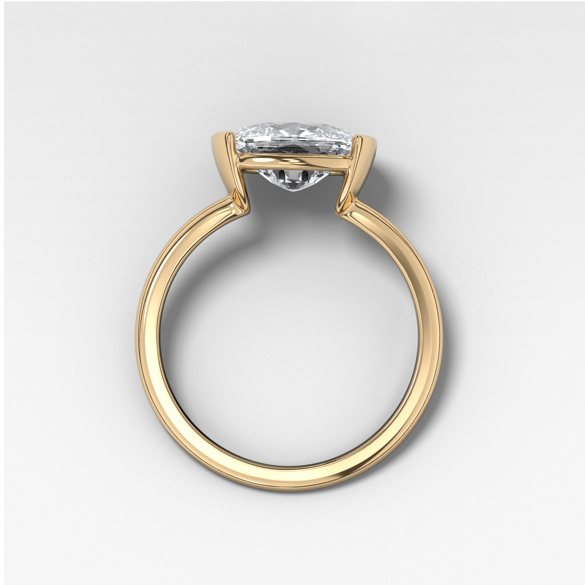 East West Half Bezel Solitaire Engagement Ring With Elongated Cushion Cut Diamond