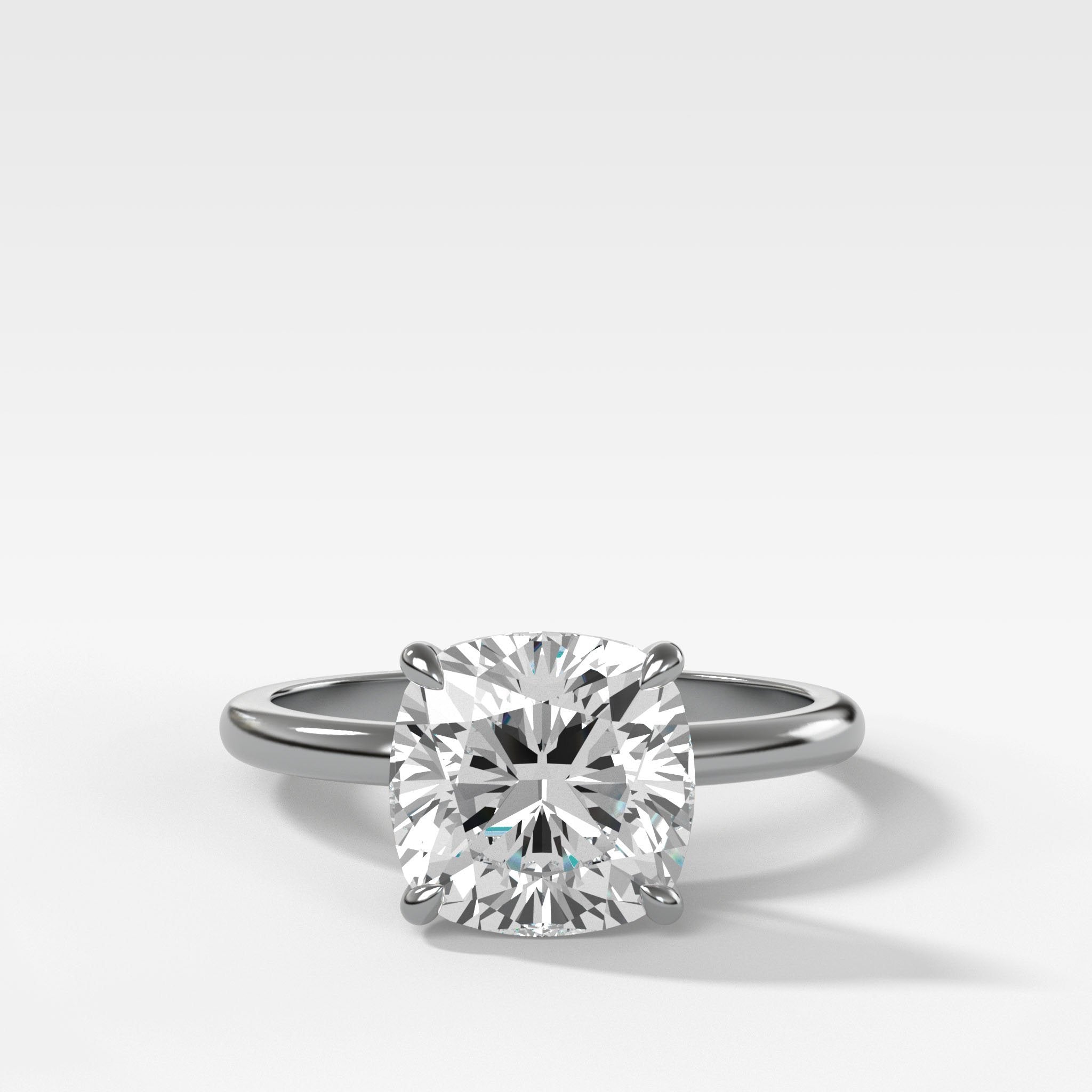 Crescent Solitaire Engagement Ring With Cushion Cut Diamond