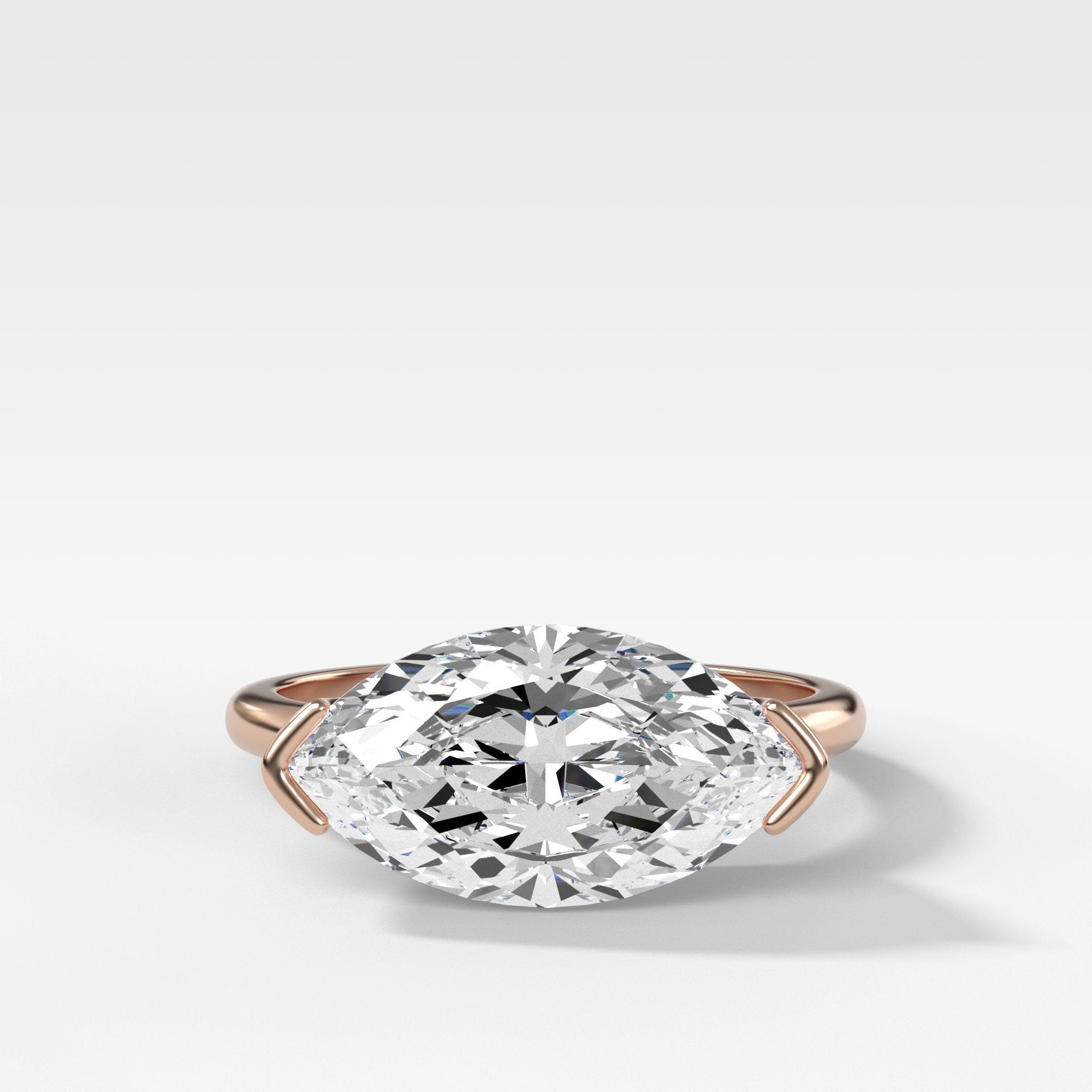 East West Half Bezel Solitaire Engagement Ring With Marquise Cut Diamond