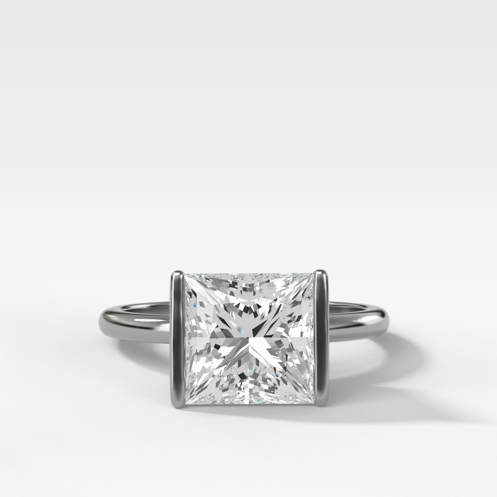 Half Bezel Solitaire Engagement Ring With Princess Cut Diamond