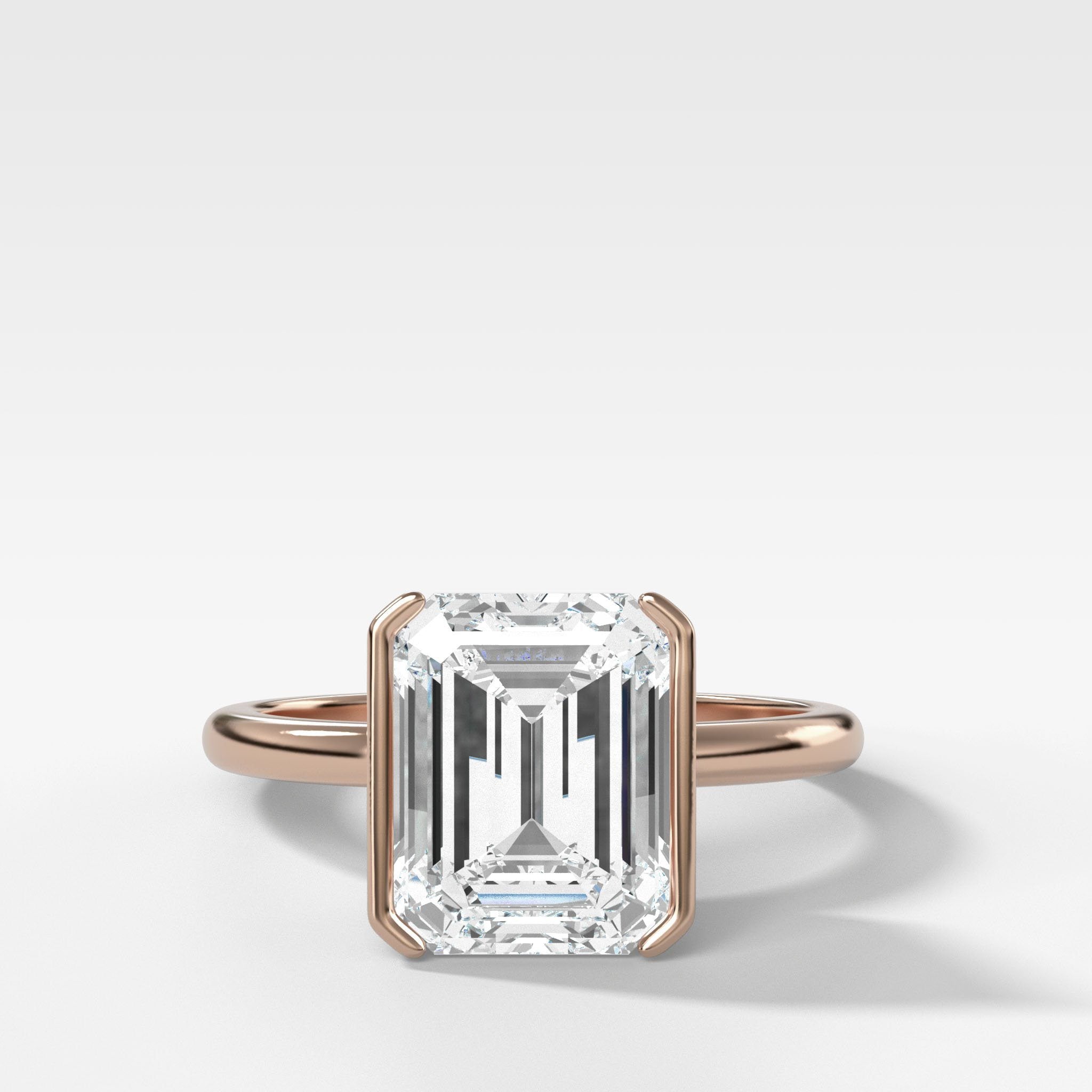 North South Half Bezel Solitaire Engagement Ring With Emerald Cut Diamond
