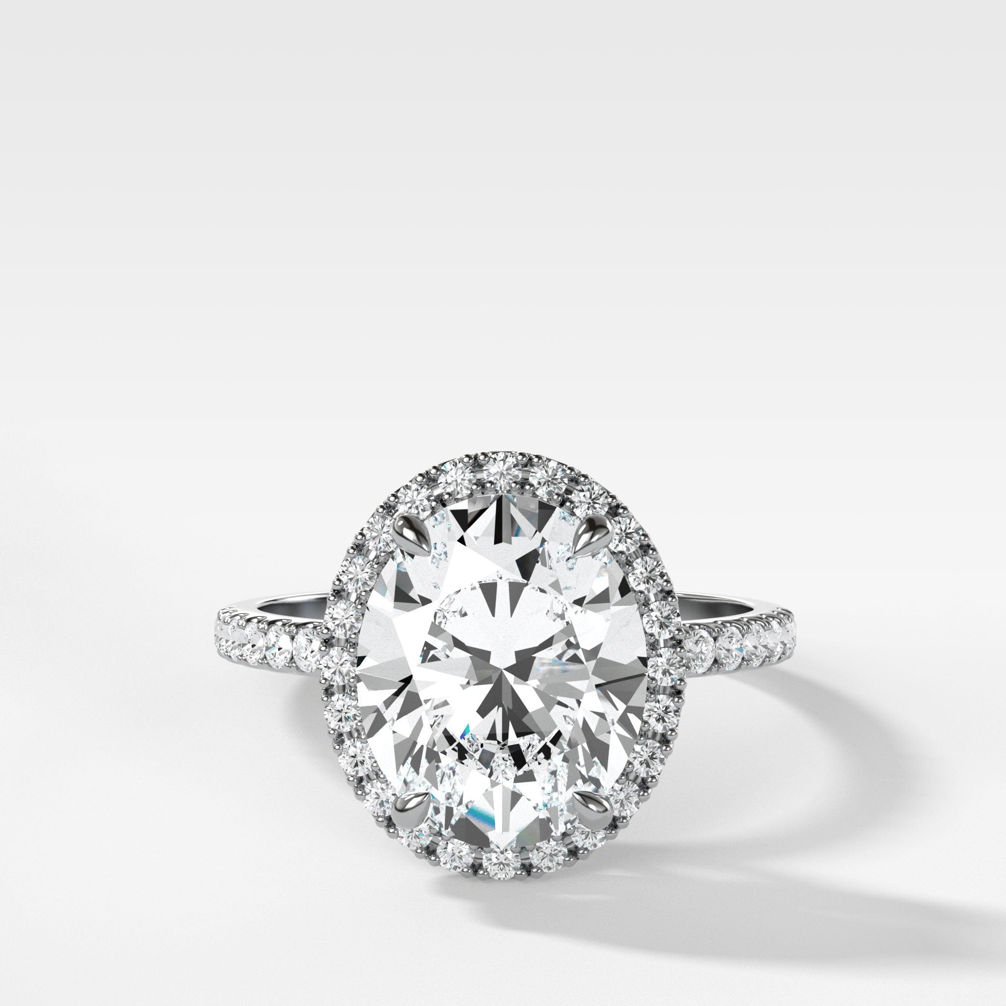 Aurora Pavé Halo Ring With Oval Cut