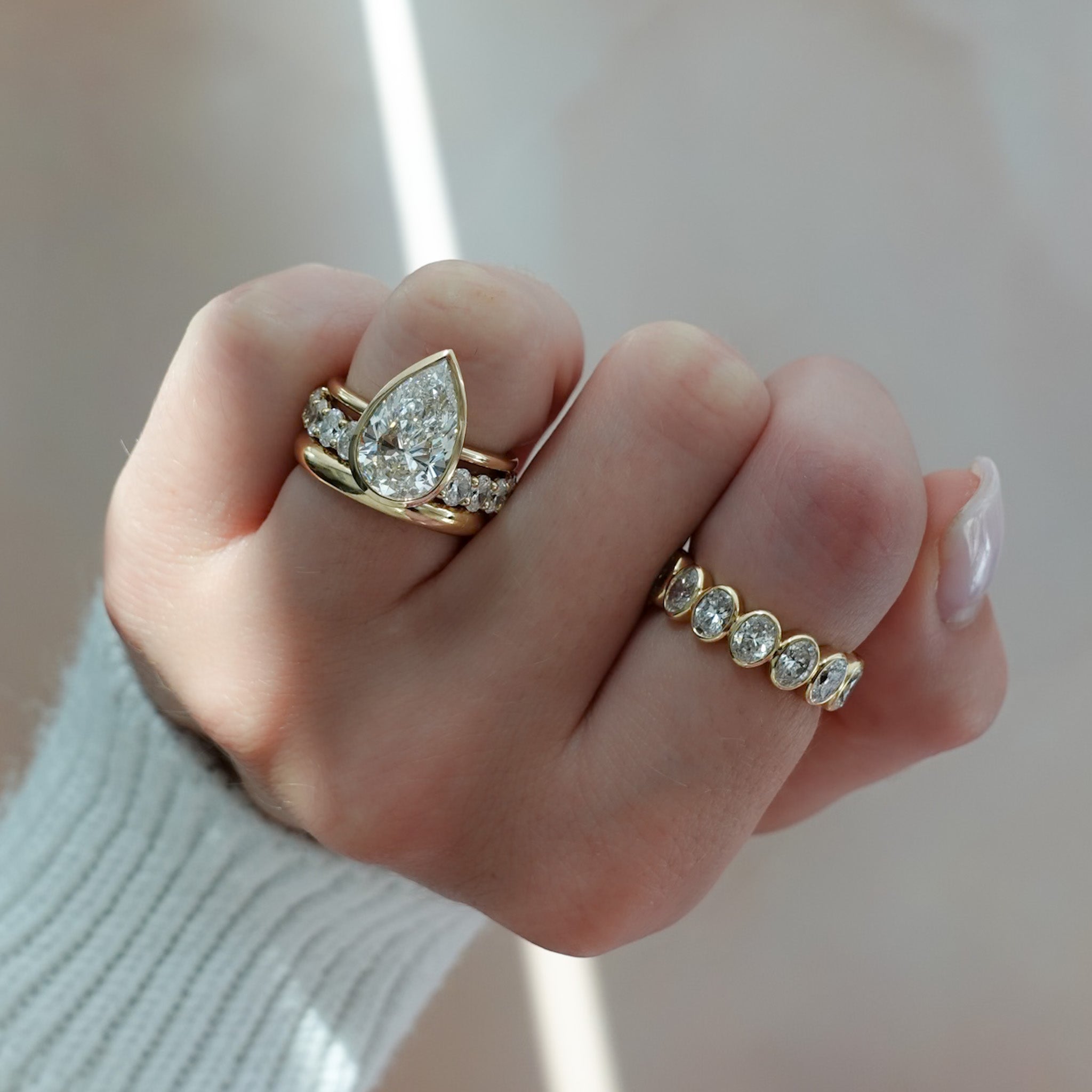 Penumbra Bezel Set Engagement Ring With Pear Cut
