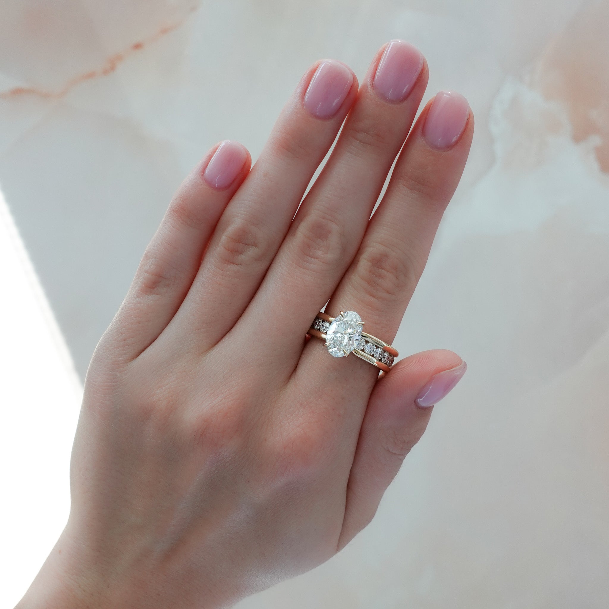 Chunky Channel Set Engagement Ring with Oval Cut Diamond