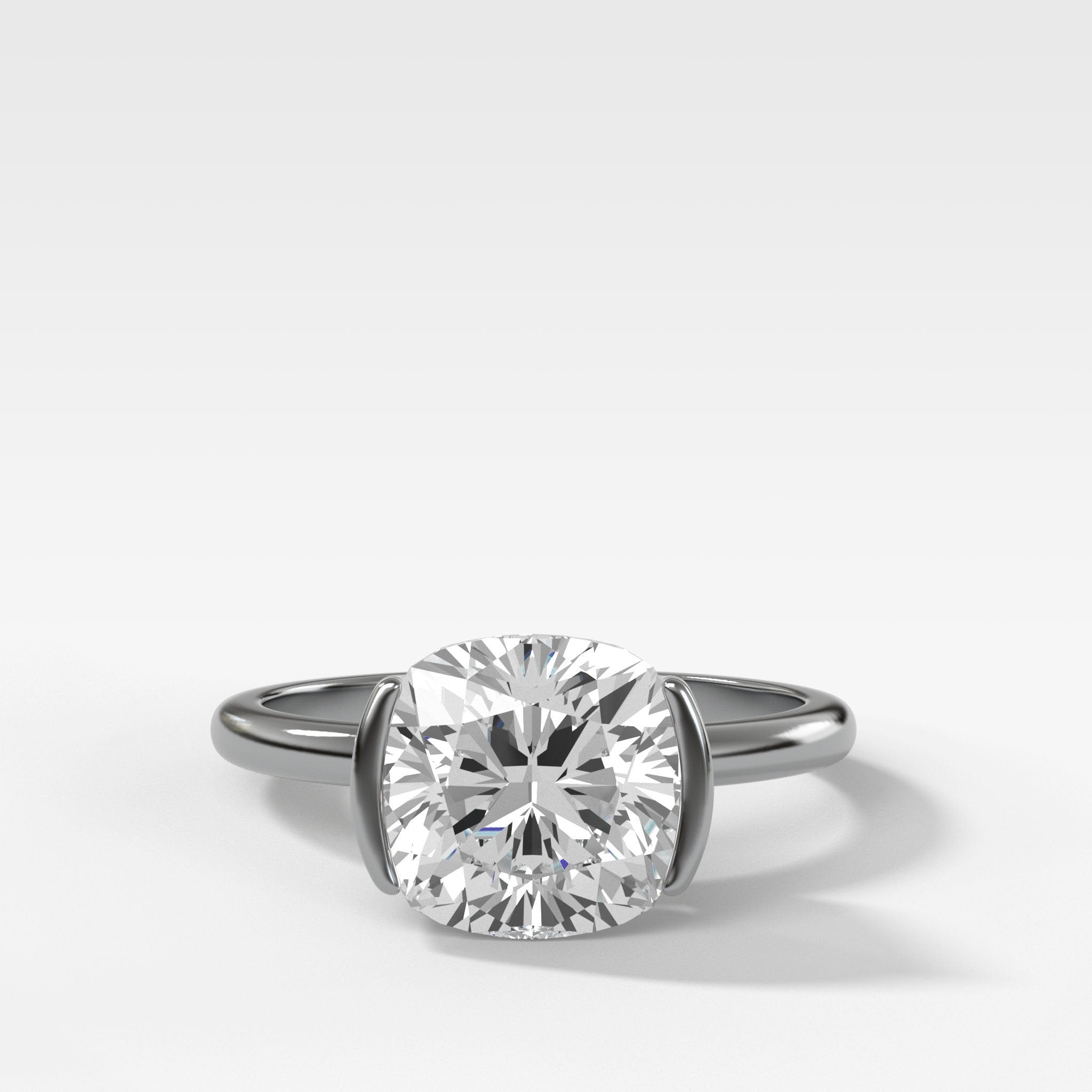 Half Bezel Solitaire Engagement Ring With Cushion Cut Diamond