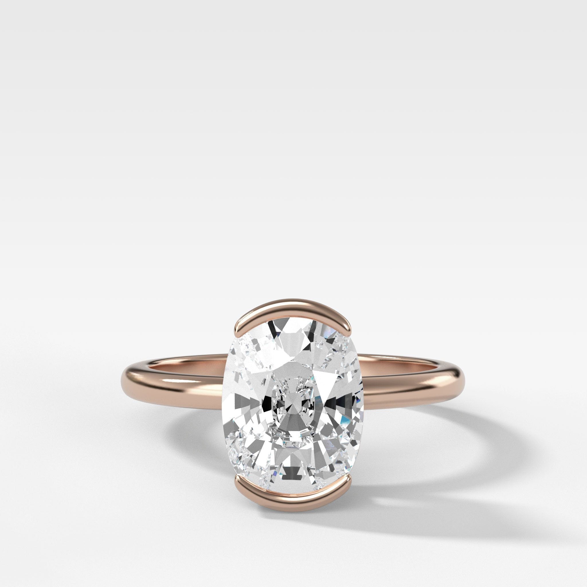 North South Half Bezel Solitaire Engagement Ring With Elongated Cushion Cut Diamond