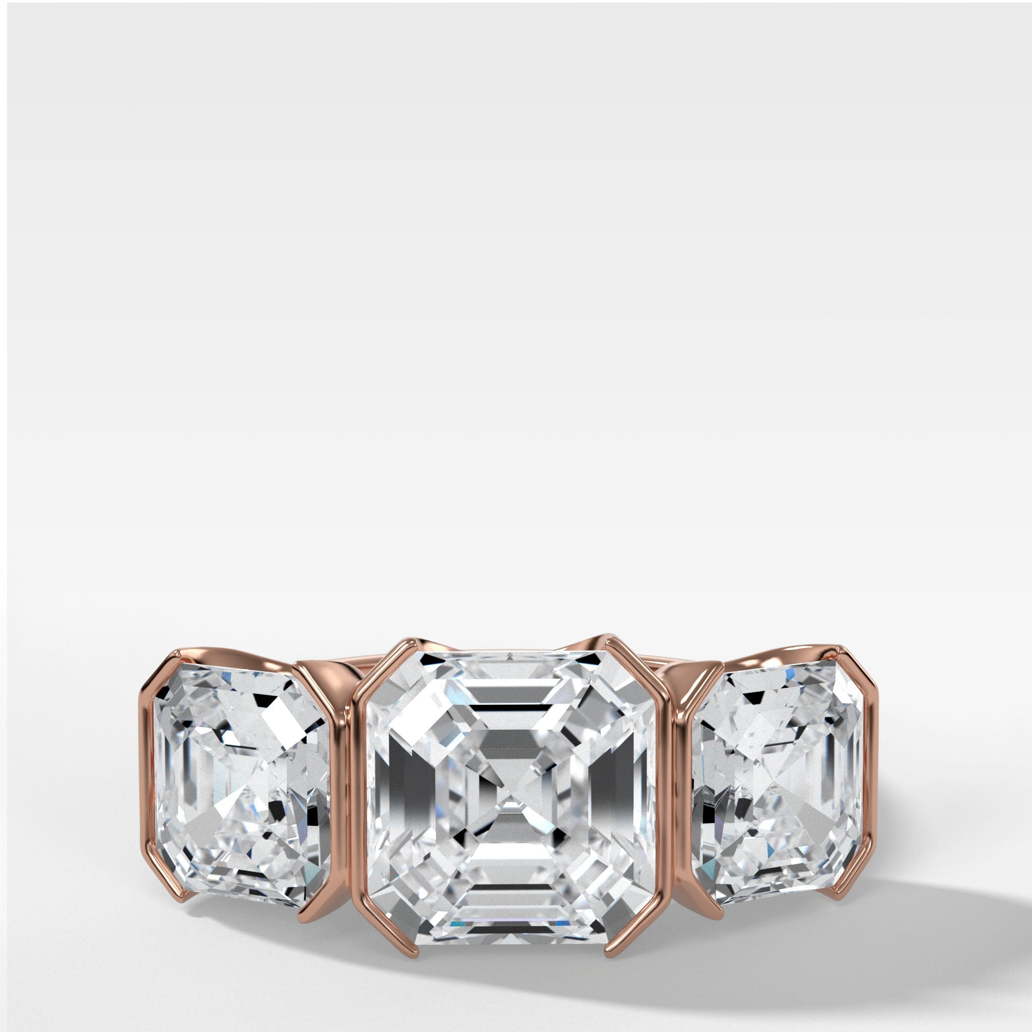 Half Bezel Triad Engagement Ring With Asscher Cut Diamonds