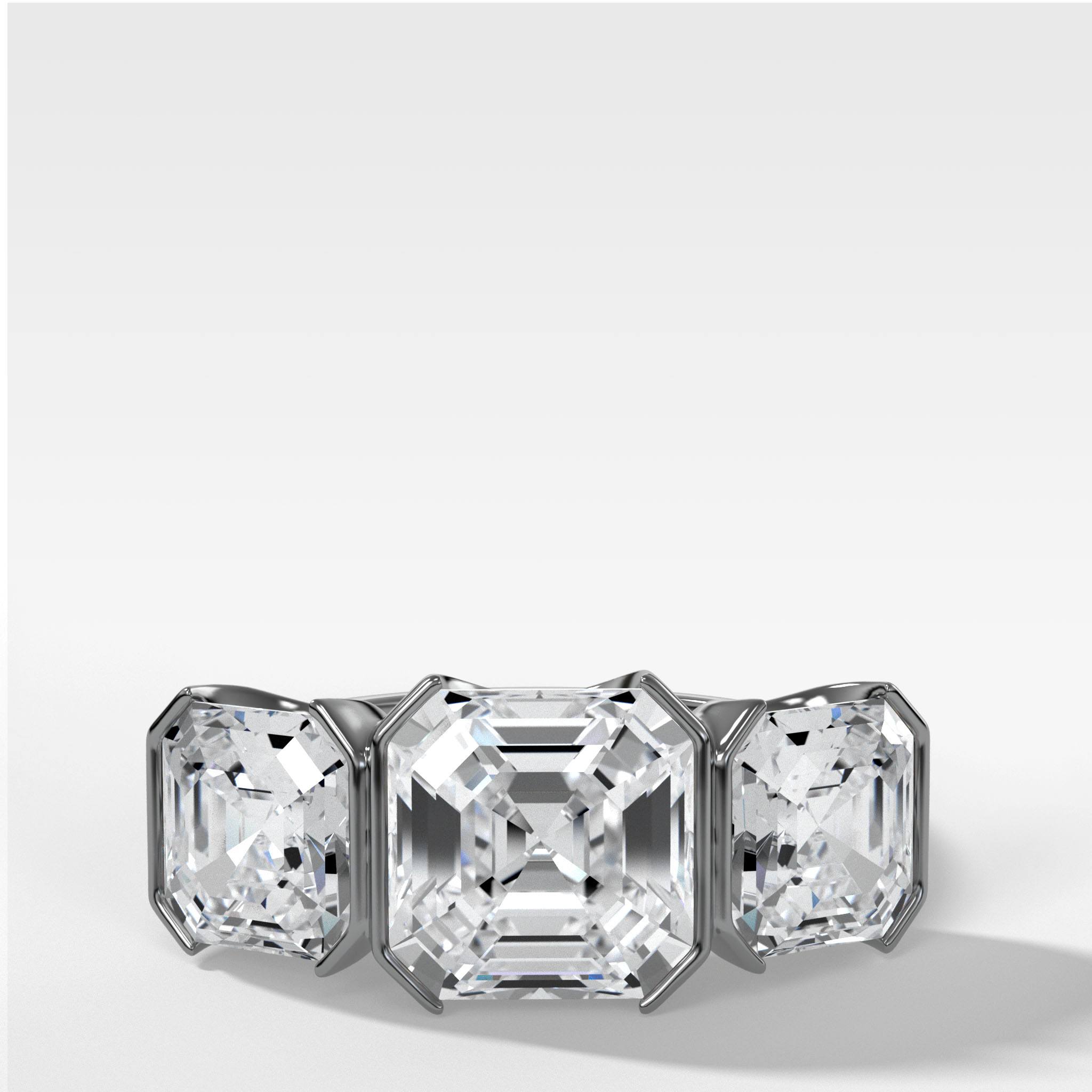 Half Bezel Triad Engagement Ring With Asscher Cut Diamonds